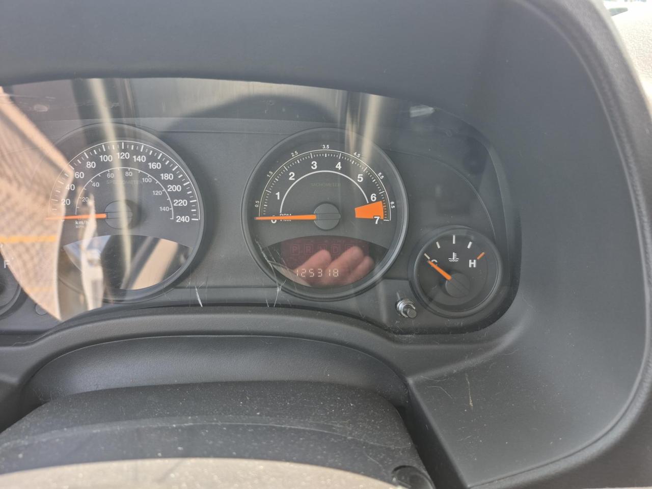 12744933