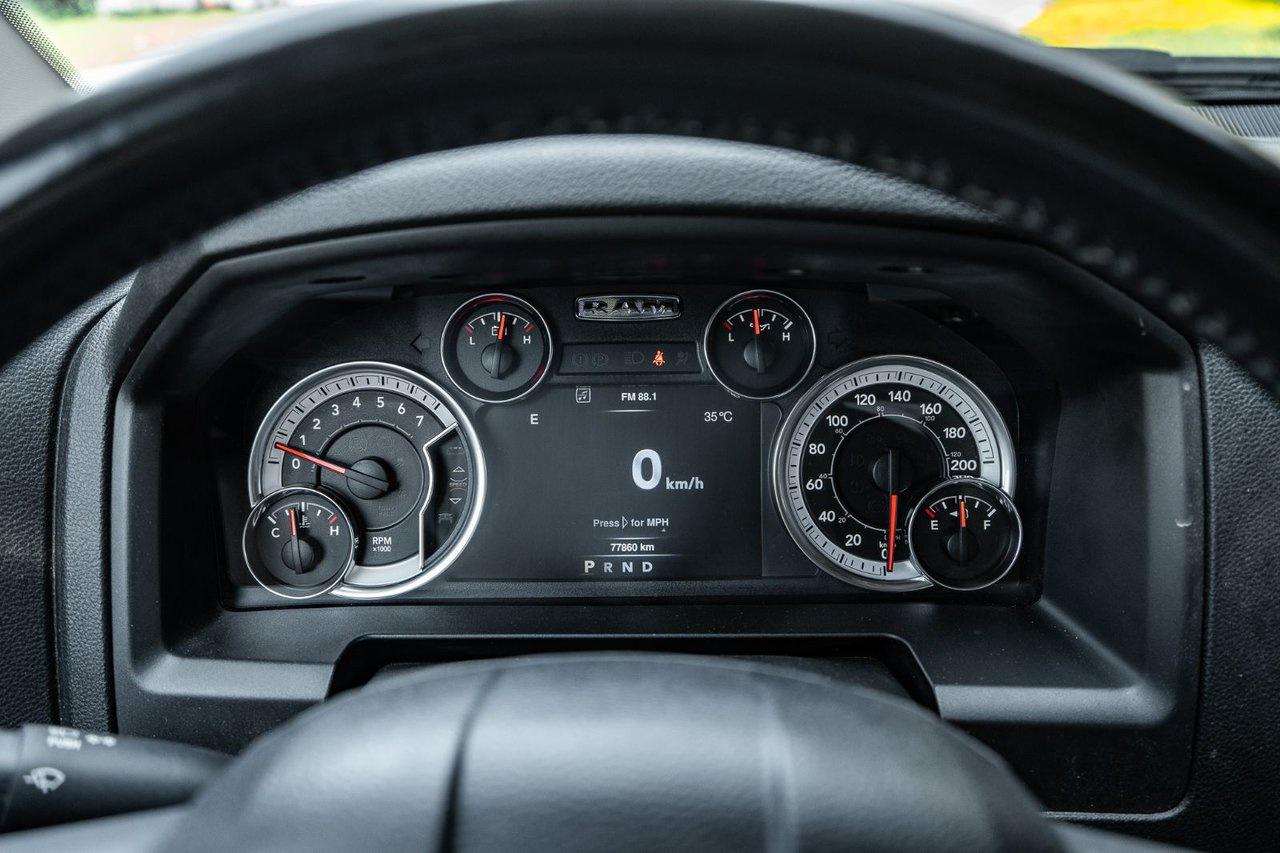 12746895
