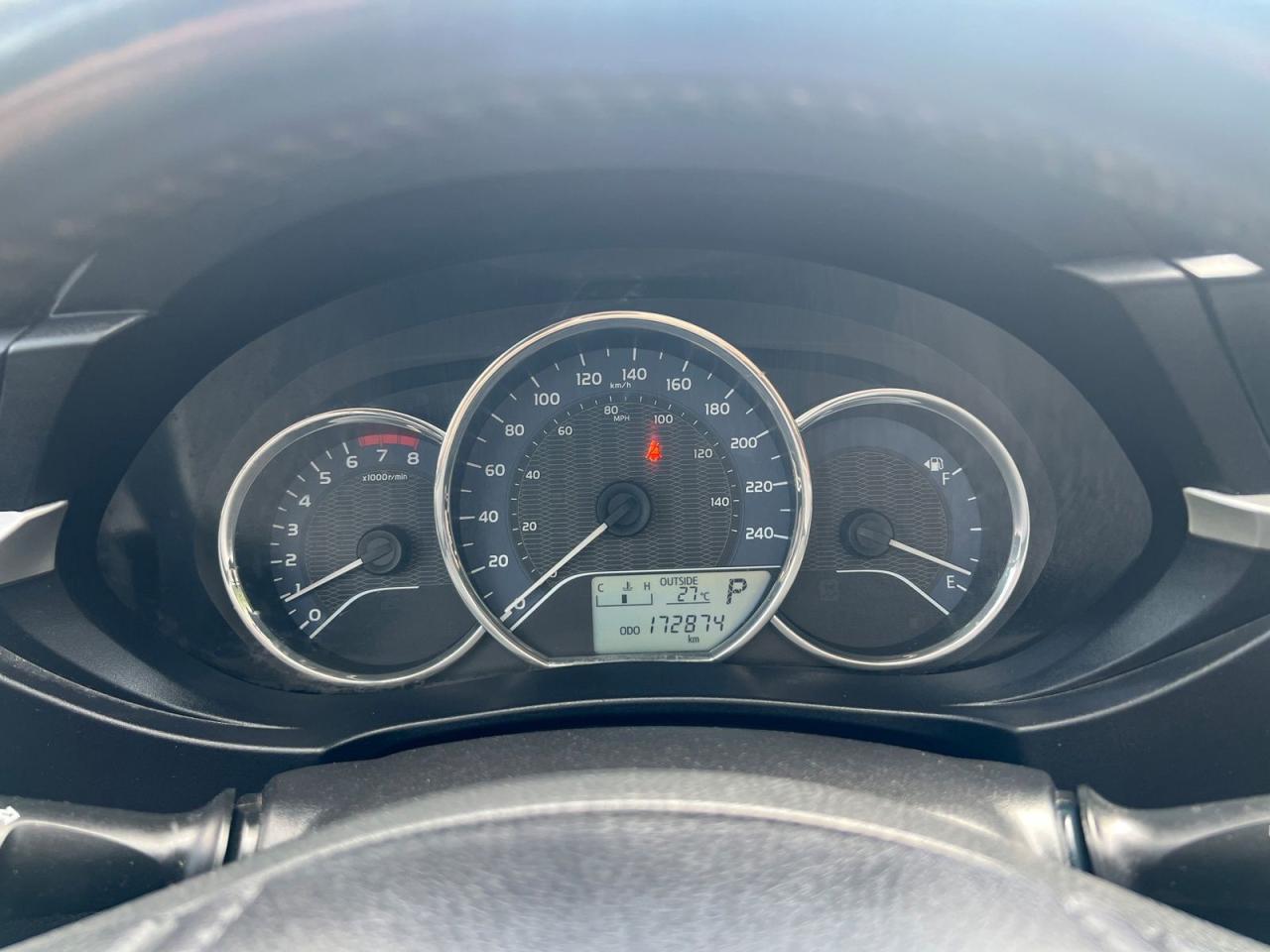 12748929