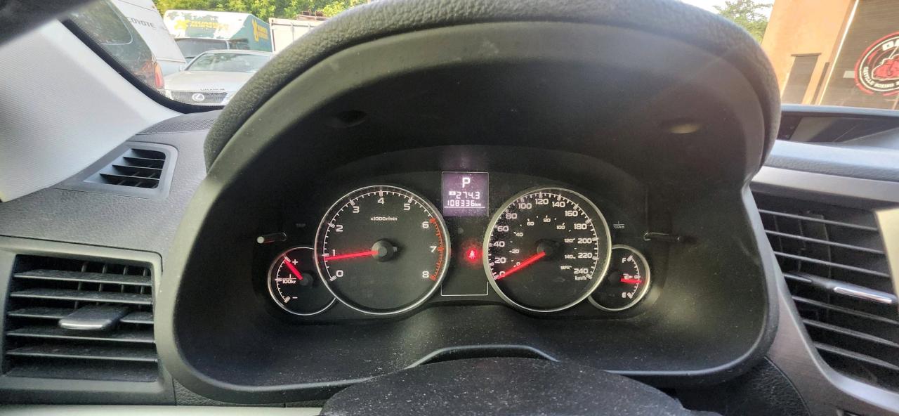 12748962