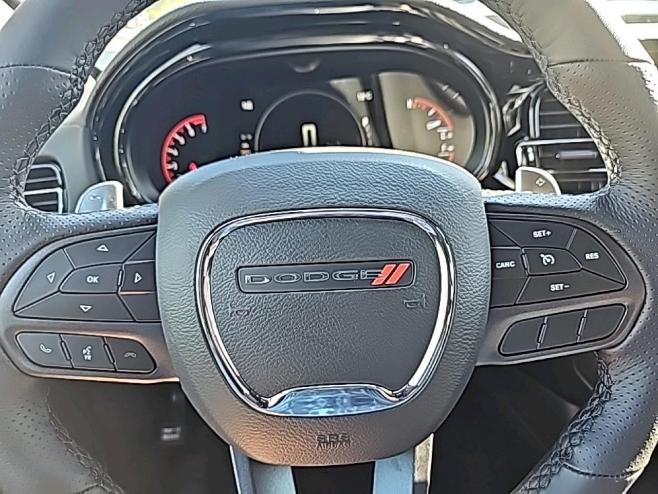 12749340