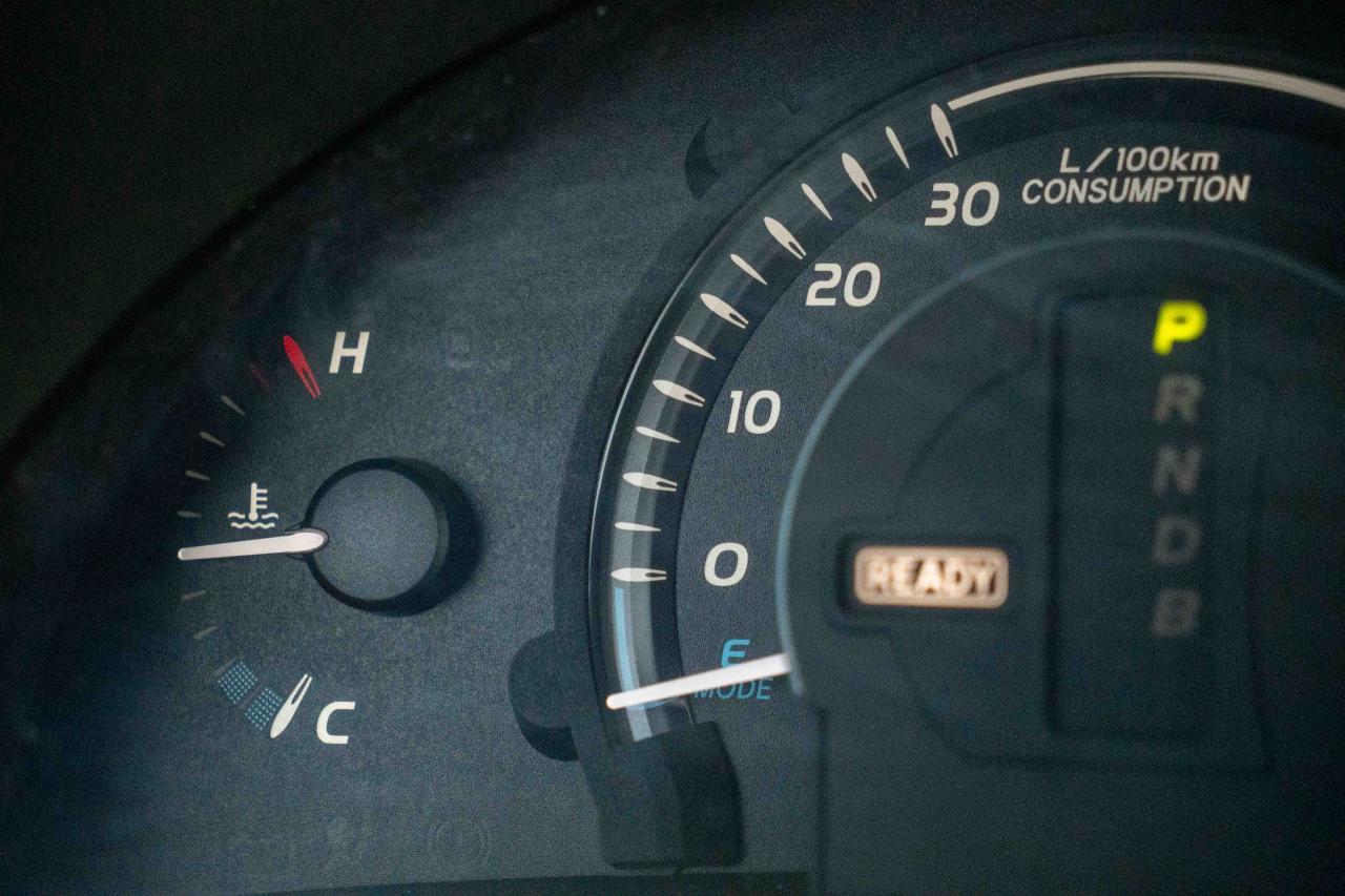 12749457