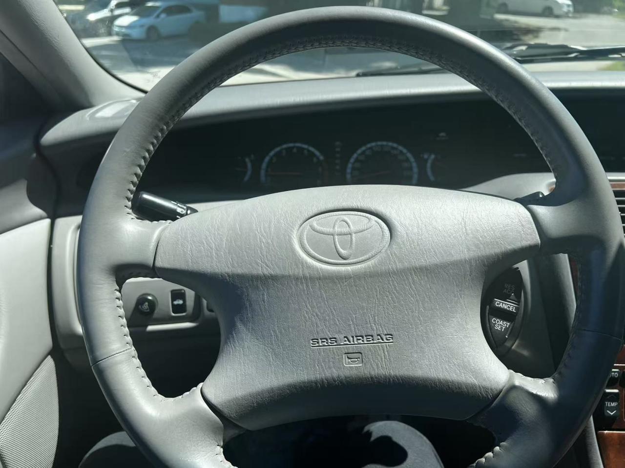 12751218