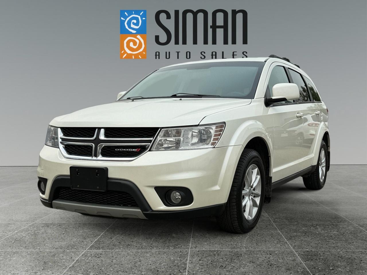 ## ?? V6 with Extra Features - **CLEARANCE PRICED!** ??

**?? WAS $15,988 | NOW ONLY $12,988! ??**

Ready for your next family adventure? Look no further than this incredible 2017 Dodge Journey V6, available now at Siman Auto Sales!

### ? Key Features & Peace of Mind

* **Powerful V6 Engine:** Smooth and capable, offering plenty of power for highway cruising and city driving without sacrificing efficiency.
* **Family Entertainment:** Integrated **DVD Entertainment System** to keep the kids happy on long trips.
* **Premium Tech:**
    * Intuitive **Navigation System**never get lost again.
    * Seamless **Bluetooth connectivity**.
    * **SiriusXM radio** and a classic **CD player** for all your tunes.
* **Confidence & Comfort:**
    * **Backup Sensors and Rear Camera** make maneuvering in tight spots a breeze.
    * Power **Sunroof** to let the fresh air and natural light in on sunny days.

### ? Presale Inspection Completed

We ensure this vehicle is ready to go! Presale inspection completed, including:
* New oil filter housing
* Fresh full synthetic oil service
* New rear Brakes

### ?? The Siman Auto Sales Difference

For **26 years**, weve been proudly serving Regina, earning a reputation for **trust and customer satisfaction**just check our reviews!

At Siman Auto Sales, we make buying your next vehicle **easy**:
* **Easy Financing:** Options available right on site, working with various lenders to get you the best rates, even if you have less-than-perfect credit.
* **Added Protection:** Aftermarket warranties are available to protect your investment.
* **Selection:** With over 60 quality vehicles to choose from, were confident youll find the perfect fit.

**Come visit us today and experience the Siman Auto Sales differencewhere your journey truly begins!**