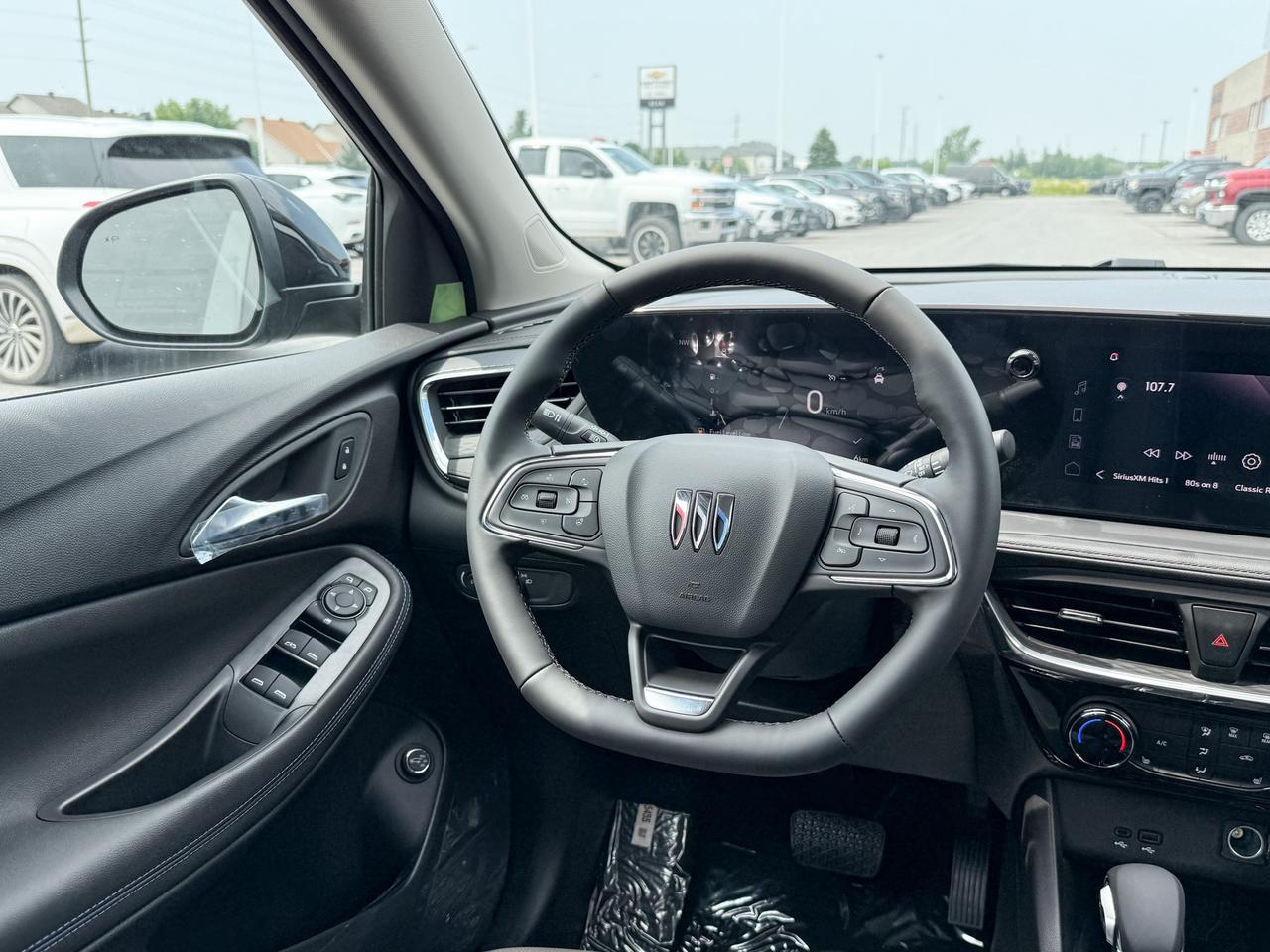 2026 Buick Encore GX Sport Touring 1.3L 3CYL WITH REMOTE START/ENTRY, HEATED SEATS, HEATED STEERING WHEEL, HD REAR VISION CAMERA, APPLE CARPLAY AND ANDROID AUTO Photo