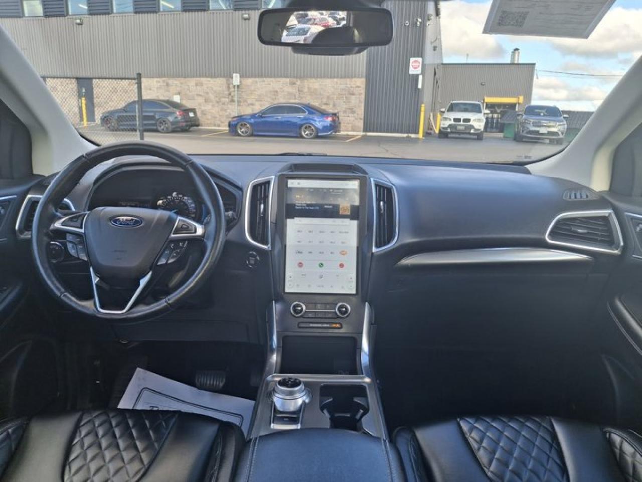 2023 Ford Edge Titanium AWD | Leather | Panoramic Sunroof | Nav | Heated Seats | CarPlay + Android | New Tires | Photo