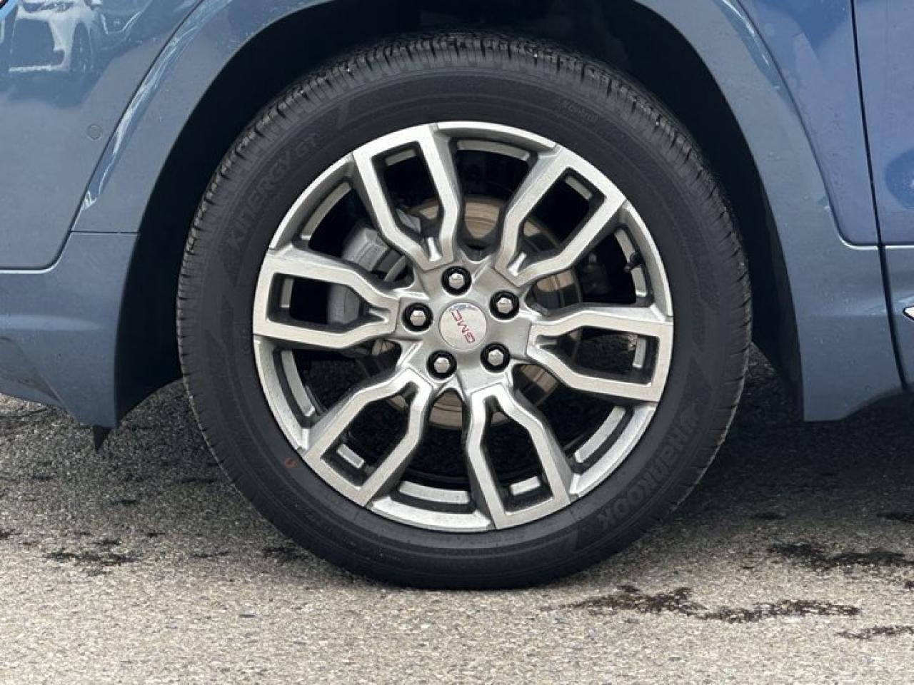 12754605