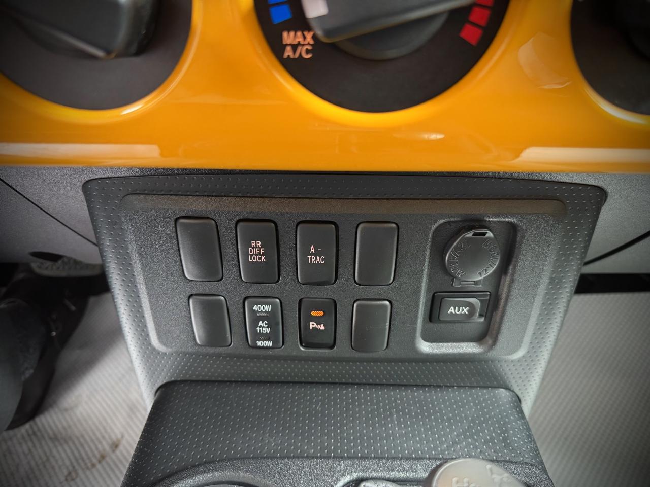 12757077