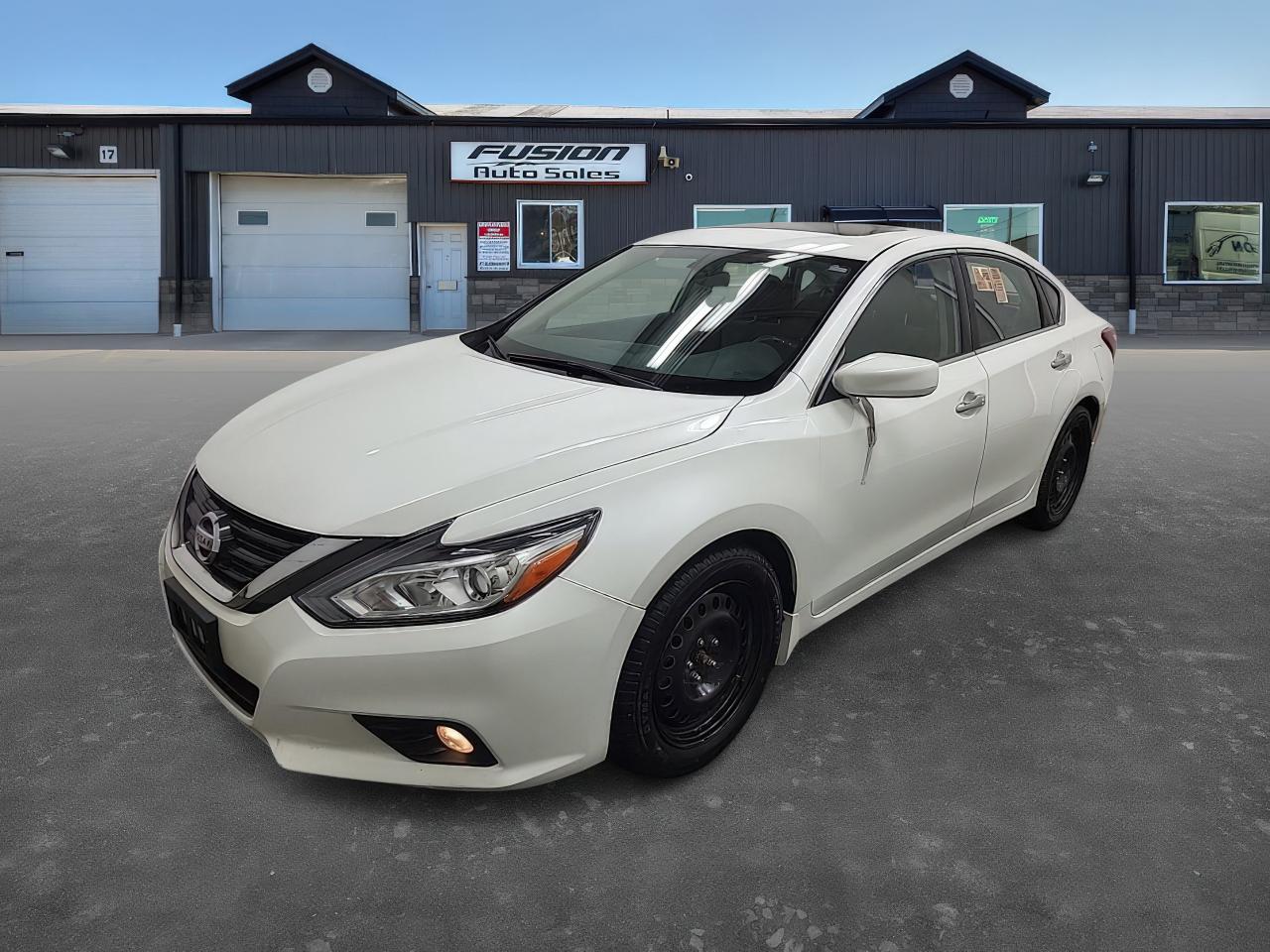 <p>UNIT IN TRANSIT.</p><p>Looking for a reliable and stylish sedan that offers a comfortable driving experience? Check out this pristine 2018 Nissan Altima 2.5 SV, available now at Fusion Auto Sales! This sleek white sedan boasts a sophisticated black interior, providing a timeless aesthetic both inside and out. With only 125,269km on the odometer, this well-maintained Altima is ready to hit the road and provide you with years of dependable service. Its fuel-efficient 2.5L V4 engine and smooth variable transmission make every drive a pleasure.</p><p>This Altima 2.5 SV is packed with features designed to enhance your driving experience. Youll appreciate the sedans practical four-door design and front-wheel drive, perfect for navigating Canadian roads. The CVT transmission ensures seamless gear changes, contributing to a comfortable and efficient ride. This sedan is the perfect blend of practicality, style, and performance. Visit Fusion Auto Sales today to see this exceptional vehicle!</p><p>Here are some of the features that make this Altima stand out:</p><ul><li><strong>Fuel-Efficient Performance:</strong> Enjoy a balance of power and economy with the 2.5L V4 engine.</li><li><strong>Smooth CVT Transmission:</strong> Experience seamless gear shifts for a comfortable and effortless drive.</li><li><strong>Stylish Design:</strong> Turn heads with its clean white exterior and sophisticated black interior.</li><li><strong>Comfortable Interior:</strong> Enjoy a spacious and well-appointed cabin.</li><li><strong>Reliable Nissan Engineering:</strong> Drive with confidence knowing this Altima is built for dependability.</li></ul><p><strong><em>Powered by AutoIntelligence™</em></strong> Vehicle information has been generated using artificial intelligence and is provided for informational purposes only. While efforts are made to ensure accuracy, please confirm all details directly with the dealer.</p><p>The Fusion Philosophy<br /><br />At Fusion Auto Sales, we put more effort into buying our vehicles than we do trying to sell them. By constantly monitoring what other car lots are doing, we strive to be the lowest priced dealer in our market. We won’t purchase a vehicle to “fill a hole”. We know that the vehicles on our lot are great value for the money and smart shoppers realize that also. Adhering to this philosophy makes it easy for our customers. If they find a vehicle on our lot that fulfills their needs and wants, they know that they’re getting great value. <br /><br />If we don’t have what you’re looking for, we can find it! Over 150 customers have saved thousands of dollars buy joining our” locate club”. People that know what they want and what they want to pay (within reason of course), get the vehicle of their dreams and enjoy huge savings. Contact us for details.<br /><br /><br /><br />Fusion Auto Sales is in Tilbury, Ont. located between Windsor and London right off the 401. We are among 7 dealerships within a &frac12; kilometer distance which is great for out of town shoppers. We began satisfying customers in 2009 and have been doing so ever since. In 2012 Fusion was recognized as 1 of the 50 fastest growing companies in Canada. And then, in 2018, we were named one of the top 5 independent automobile dealerships in the country. <br /><br />We specialize in late model vehicles at below than average pricing, everything is fully certified and every unit is Car Proof verified and is fully disclosed with every unit. We offer every type of financing from perfect credit at great rates to credit challenges with competitive rates. We also specialize in locating vehicles for customers, we cant have everything on the lot so if you do not see it and are having a hard time finding what you are looking for, let us know and we can find it for you. Fusion Auto Sales spans its customer base from Windsor all the way to Timmins, On and every where in between. Our philosophy is You are going to like the way we deal and everyone does, straight honest answers with no monkey business and no back and forth between sales and managers.</p>