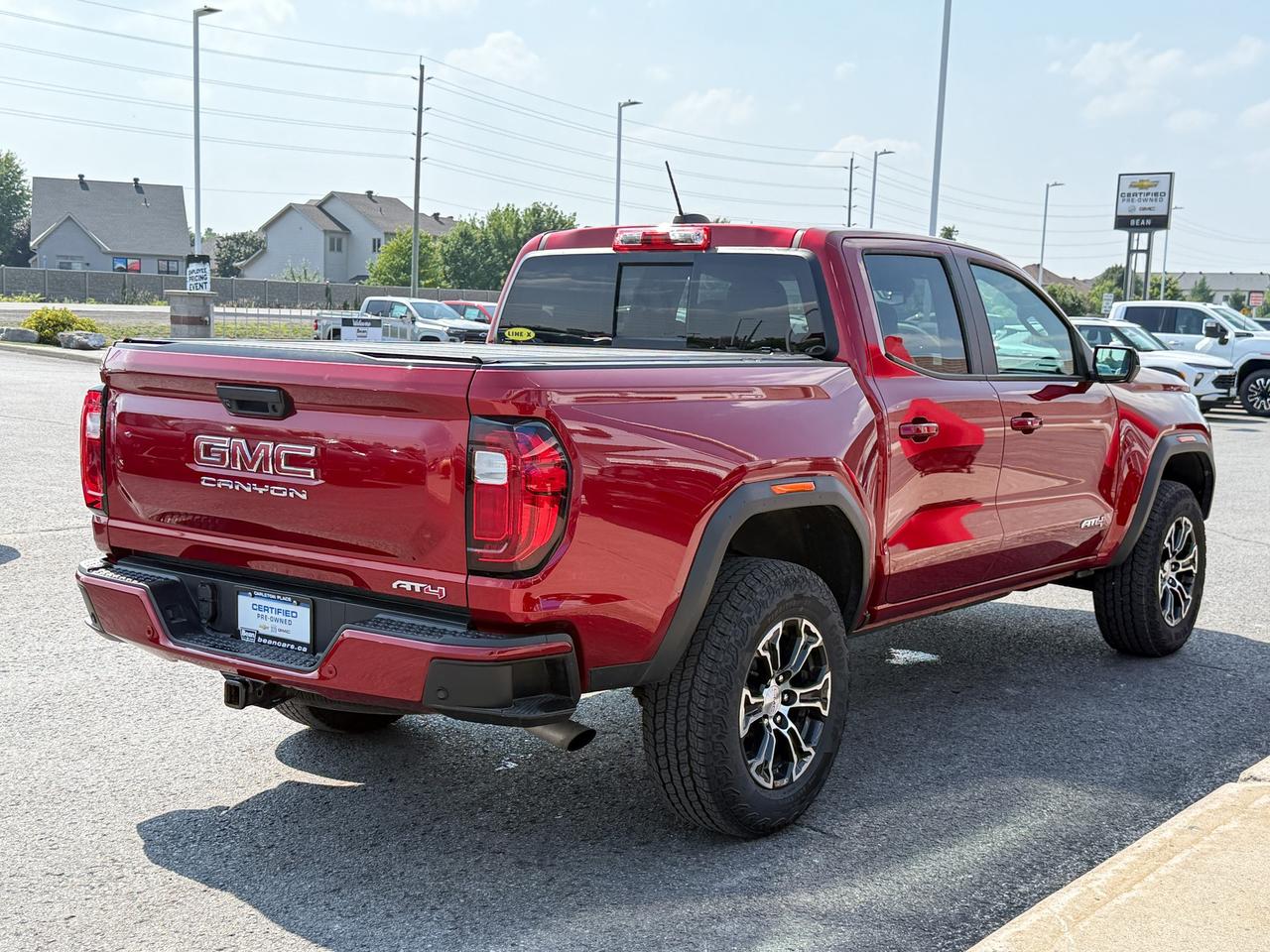 2024 GMC Canyon 2.7L 4CYL AT4 4X4 WITH OEM 2" FACTORY LIFT, HEATED LEATHER SEATS, HEATED STEERING WHEEL, REMOTE VEHICLE START, TRAILER BRAKE CONTROLLER Photo