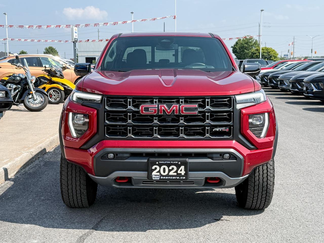 2024 GMC Canyon 2.7L 4CYL AT4 4X4 WITH OEM 2" FACTORY LIFT, HEATED LEATHER SEATS, HEATED STEERING WHEEL, REMOTE VEHICLE START, TRAILER BRAKE CONTROLLER Photo