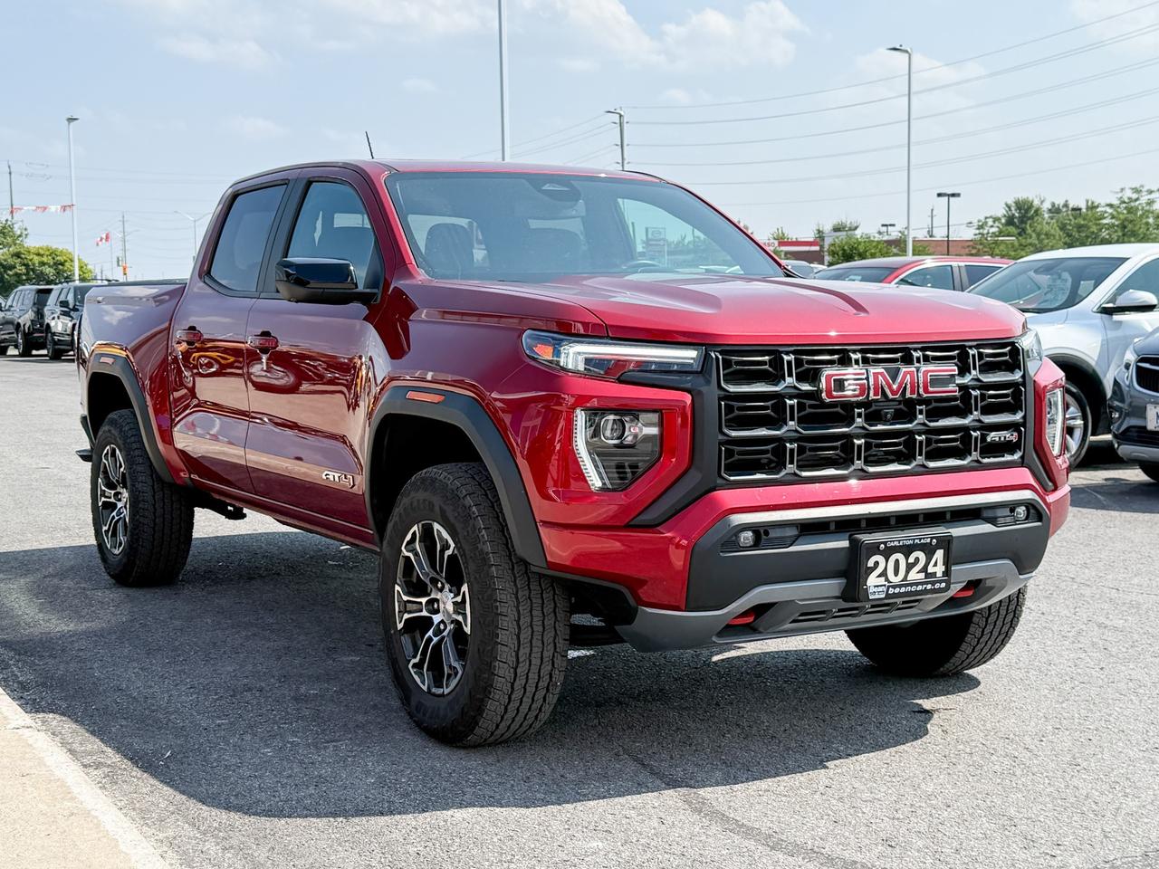 2024 GMC Canyon 2.7L 4CYL AT4 4X4 WITH OEM 2" FACTORY LIFT, HEATED LEATHER SEATS, HEATED STEERING WHEEL, REMOTE VEHICLE START, TRAILER BRAKE CONTROLLER Photo
