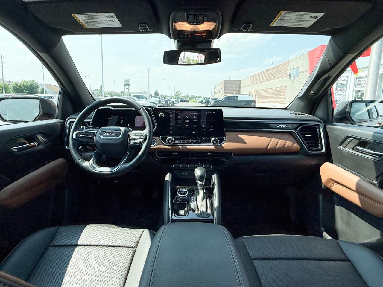 2024 GMC Canyon 2.7L 4CYL AT4 4X4 WITH OEM 2" FACTORY LIFT, HEATED LEATHER SEATS, HEATED STEERING WHEEL, REMOTE VEHICLE START, TRAILER BRAKE CONTROLLER Photo