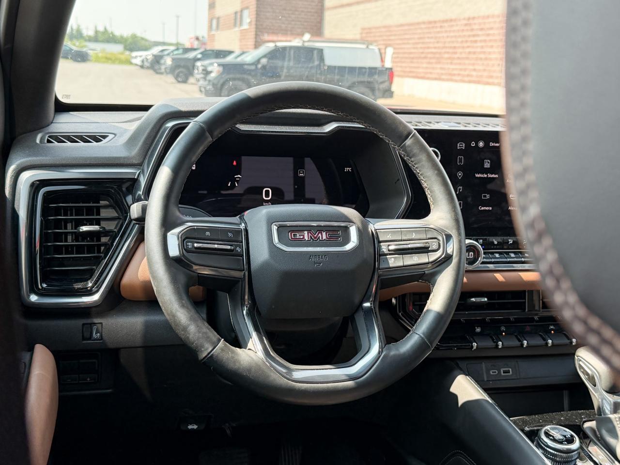 2024 GMC Canyon 2.7L 4CYL AT4 4X4 WITH OEM 2" FACTORY LIFT, HEATED LEATHER SEATS, HEATED STEERING WHEEL, REMOTE VEHICLE START, TRAILER BRAKE CONTROLLER Photo