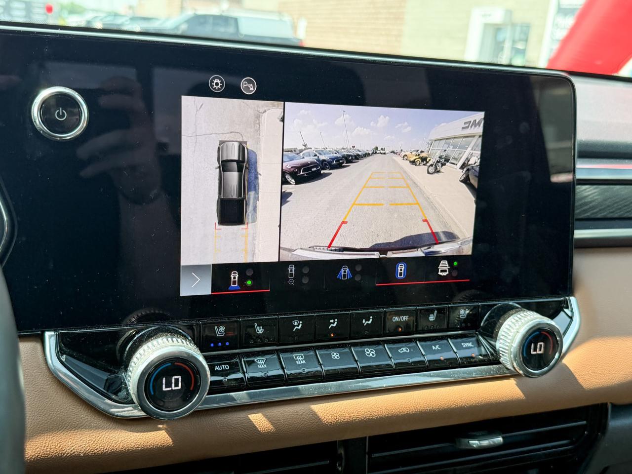 2024 GMC Canyon 2.7L 4CYL AT4 4X4 WITH OEM 2" FACTORY LIFT, HEATED LEATHER SEATS, HEATED STEERING WHEEL, REMOTE VEHICLE START, TRAILER BRAKE CONTROLLER Photo