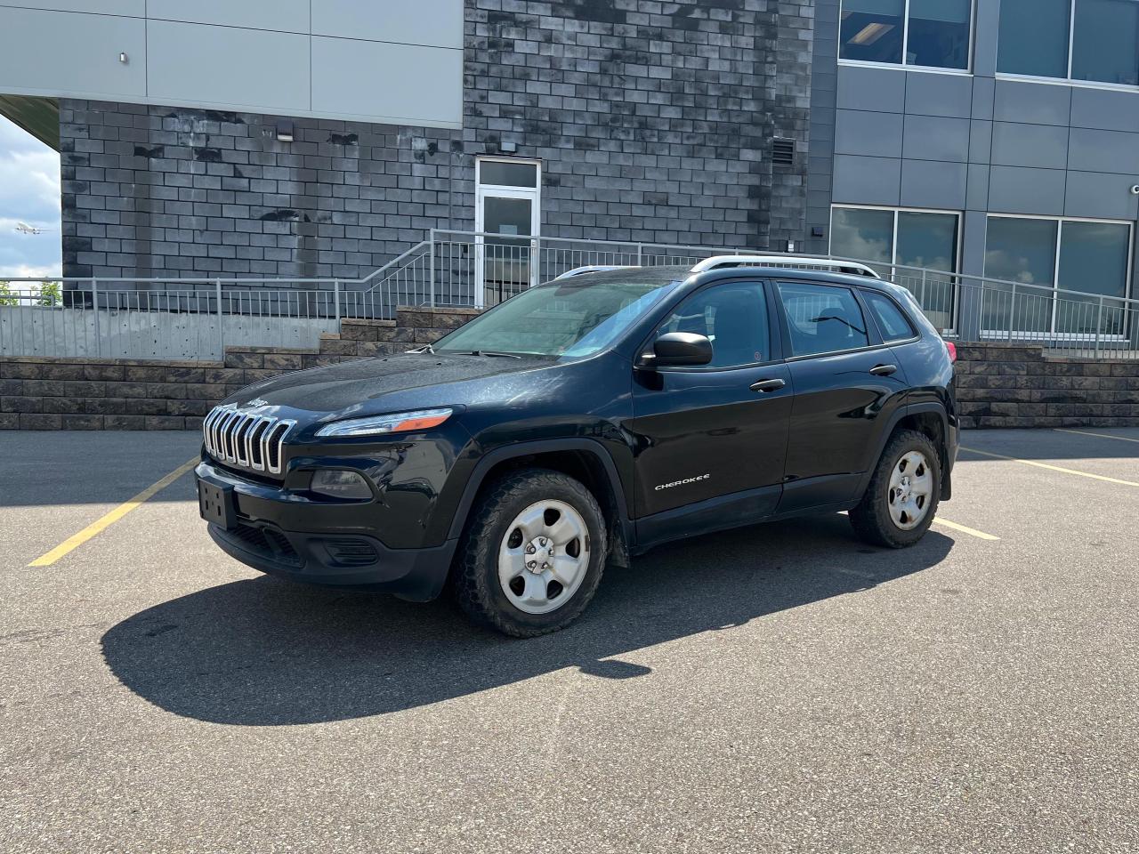 Used 2014 Jeep Cherokee Sport for sale in Calgary, AB