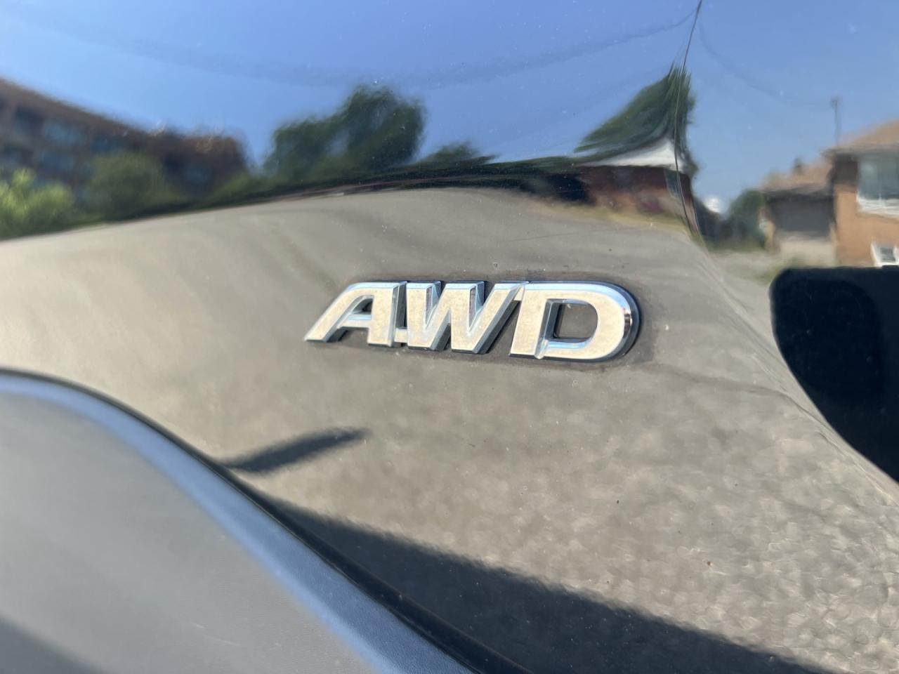 2021 Toyota RAV4 Hybrid LE AWD - Photo #9