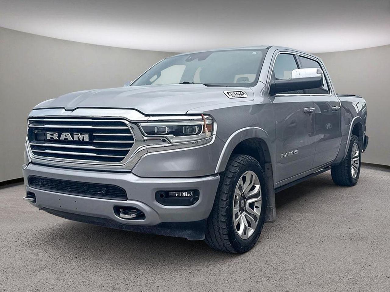 Experience luxury and capability with this pre-owned 2020 Ram 1500 Longhorn 4x4 Crew Cab 57 Box. Loaded with premium features like heated and cooled leather seats with memory settings, heated steering wheel, and woodgrain interior trim, it combines comfort with rugged performance. Tow with confidence using the tow hitch and hooks, plus enjoy safety and convenience with LED headlights, automatic high beams, rear parking aid, backup camera, and advanced connectivity including navigation, Bluetooth, WiFi hotspot, and smart device integration. With 4-wheel drive, a bed liner, and running boards, this Ram Longhorn is ready for any adventure. Upgrade your driving experience todayvisit Aurora Dodge to test drive this remarkable truck!2020 RAM 1500 LARAMIE LONGHORN HIGHLIGHTSV8 Hemi Engine4x4LeatherPanoramic SunroofHeated seats & WheelTrailer Tow GroupLevel 1 equipment12 Screen