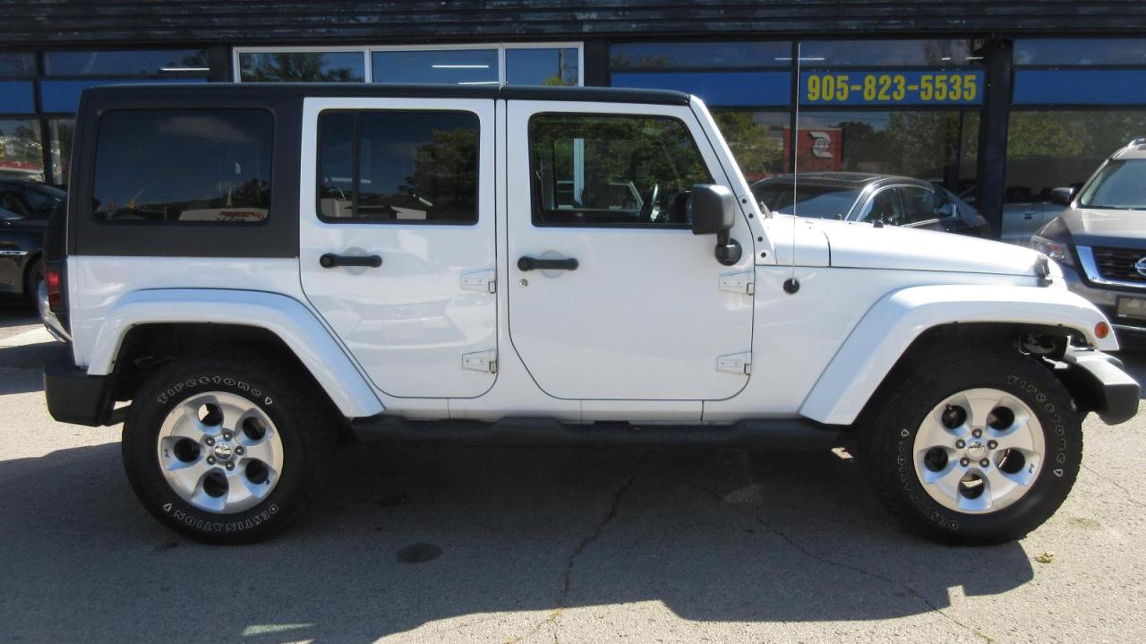 2013 Jeep Wrangler Modèle Sahara 4 portes traction intégrale - Photo #4