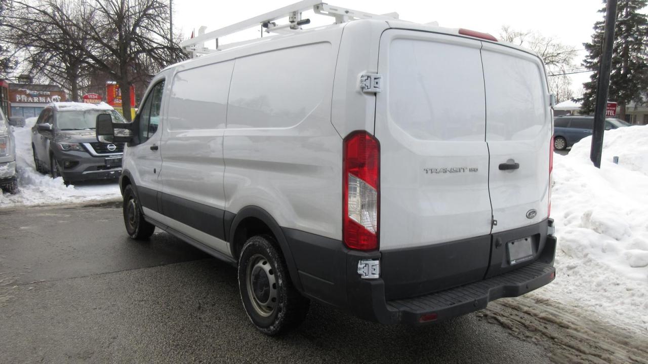 2016 Ford Transit Cargo Van T-150 toit bas 130 po PNBV de 8 600 lb porte couli - Photo #7