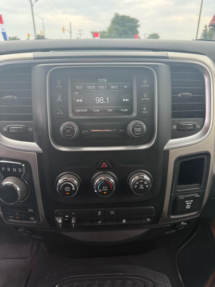 2015 RAM 1500 4WD Quad Cab SLT Photo18