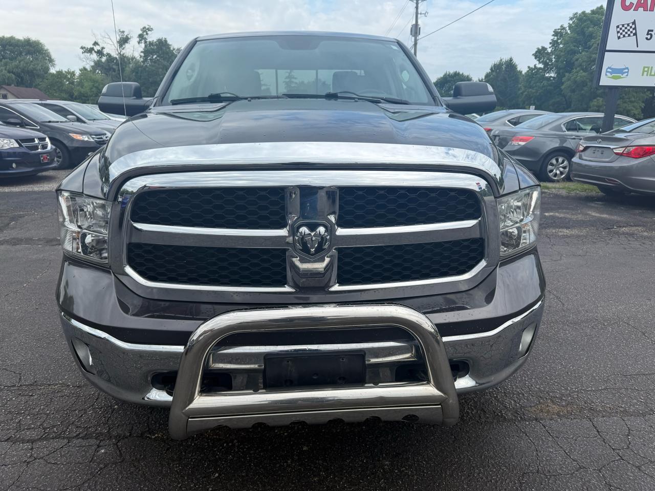 2015 RAM 1500 4WD Quad Cab SLT Photo8