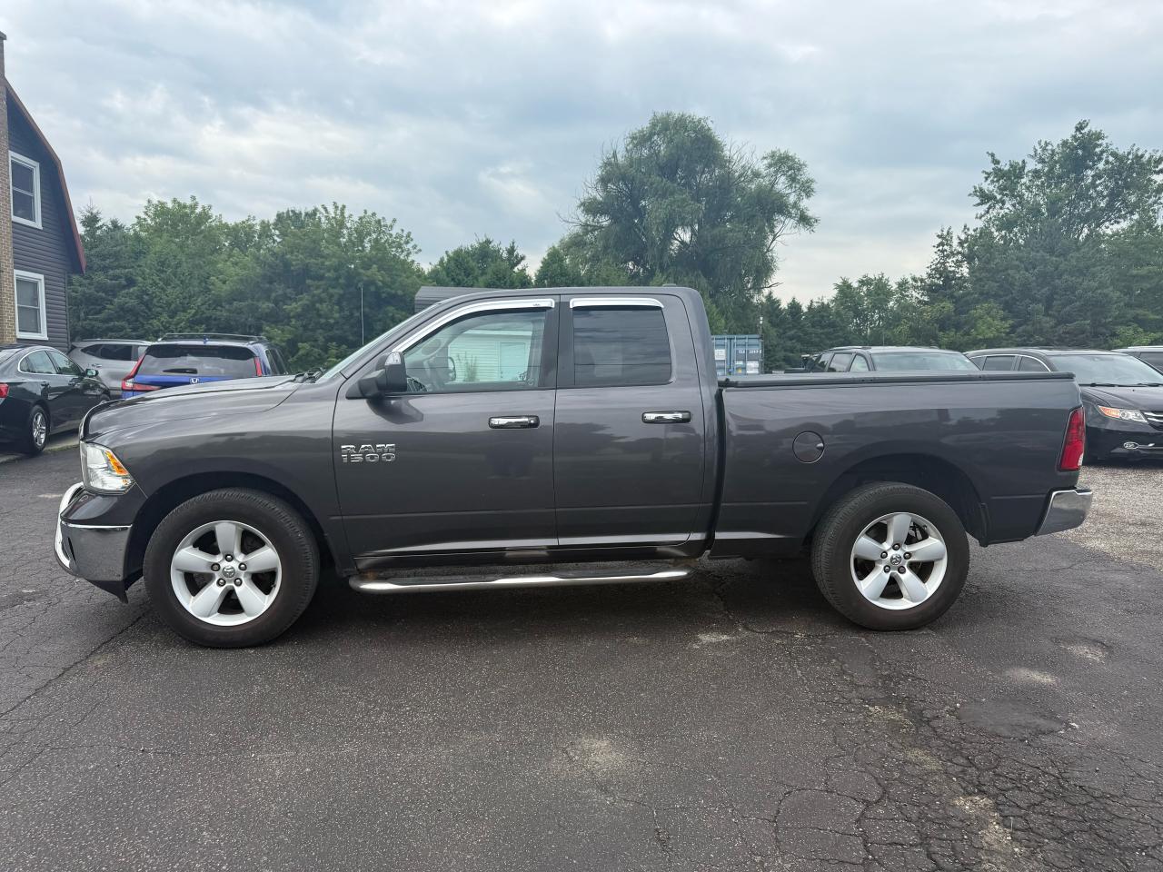 2015 RAM 1500 4WD Quad Cab SLT Photo6