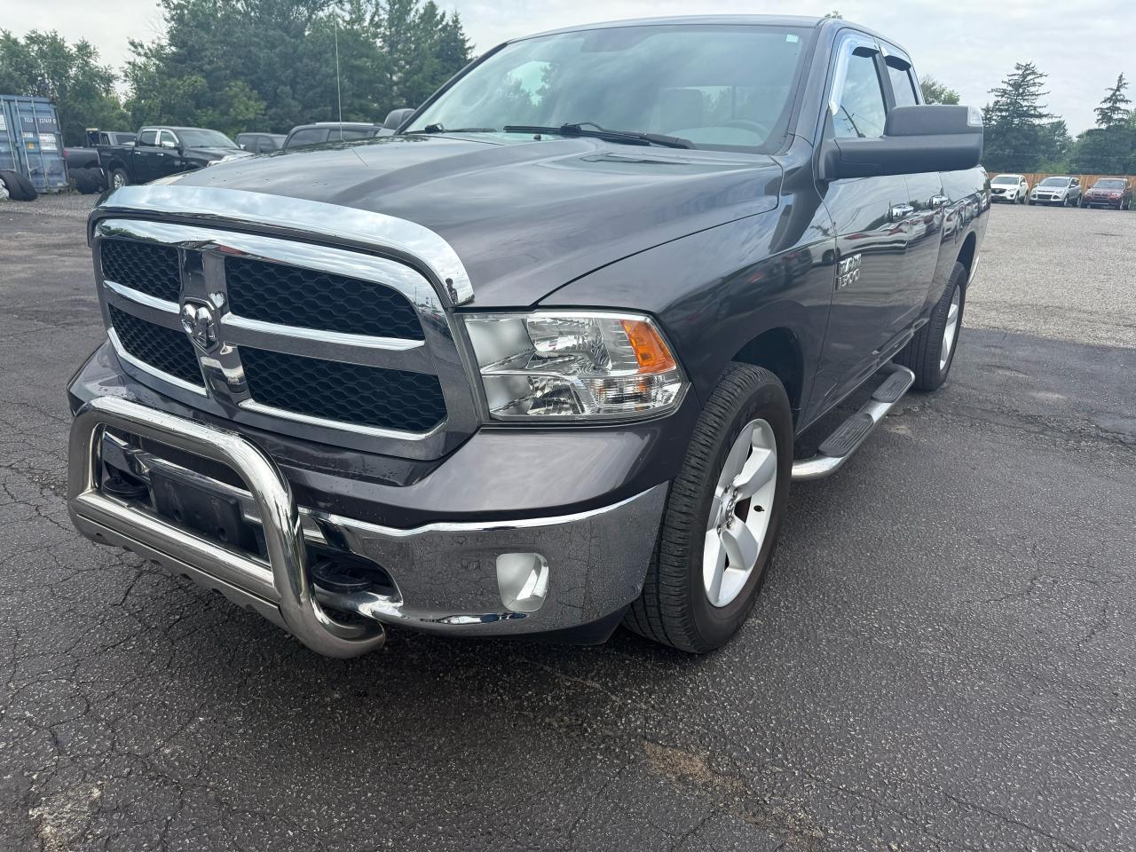 2015 RAM 1500 4WD Quad Cab SLT Photo7