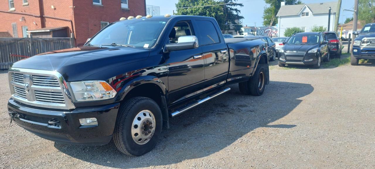 2012 RAM 3500 4WD Crew Cab 169" Laramie Limited Photo2