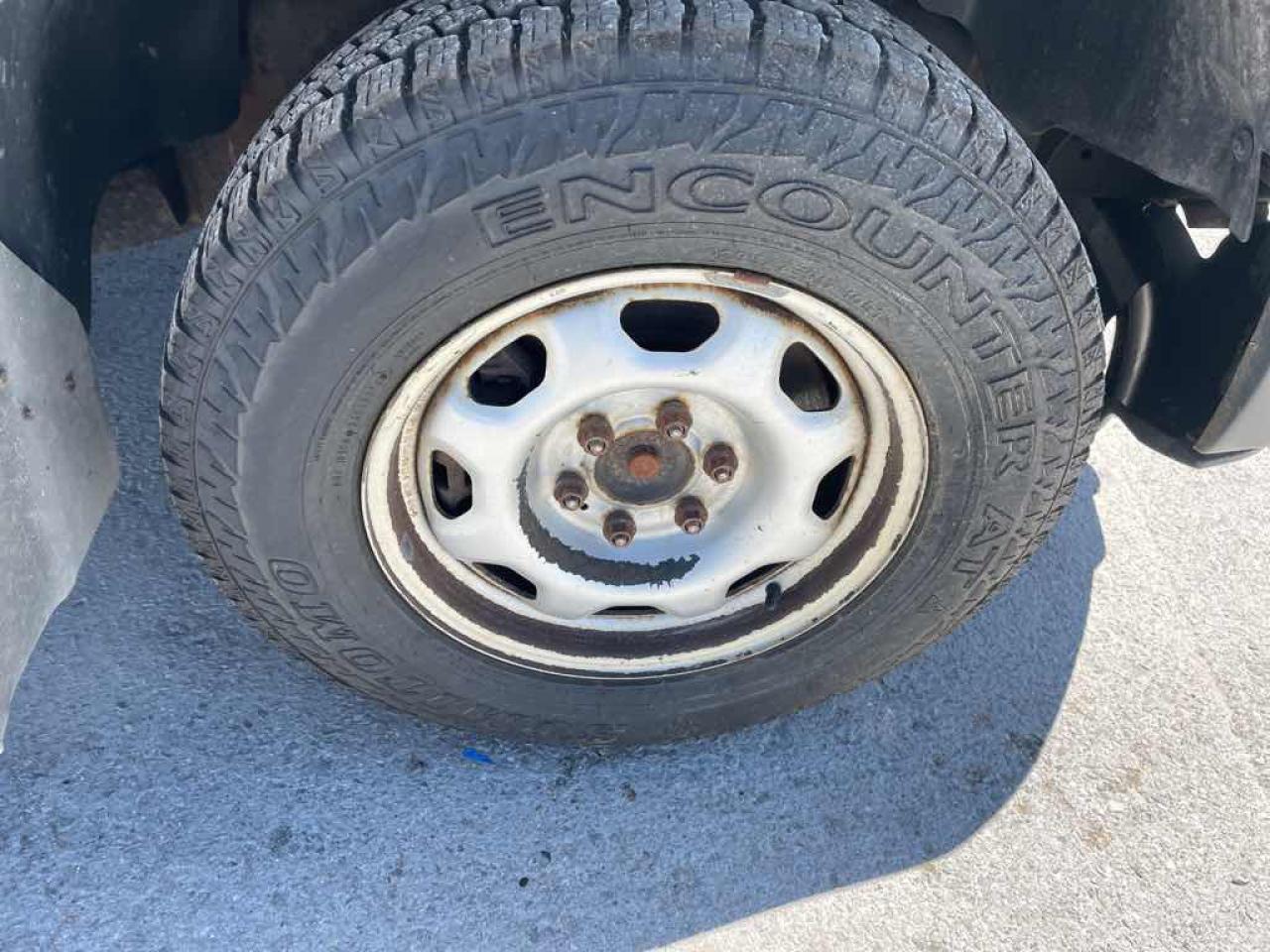 12770795
