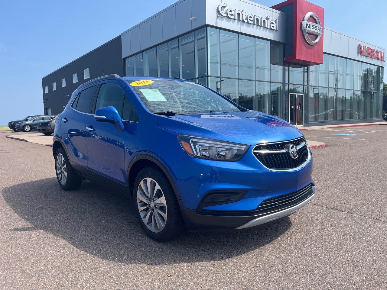 <span>The 2018 Buick Encore packs a ton of space into a package thats just right sized: perfect for parking and fuel efficiency. The Encore Preferreds turbocharged engine packs plenty of punch and the cabin is stuffed with the advanced features you want. This affordable Encore includes a rearview camera, power drivers seat, Buicks QuietTuning system with active noise cancellation for a hushed cabin, a leather-wrapped steering wheel, and an 8-inch infotainment system with Apple CarPlay/Android Auto. &nbsp;Theres a leather-wrapped steering wheel and 6-speaker audio, as well.</span>




<span style=font-weight: 400;>Thank you for your interest in this vehicle. Its located at Centennial Nissan, 264 Pope Road, Summerside, PEI. We look forward to hearing from you; call us toll-free at 1-902-436-9159.</span>