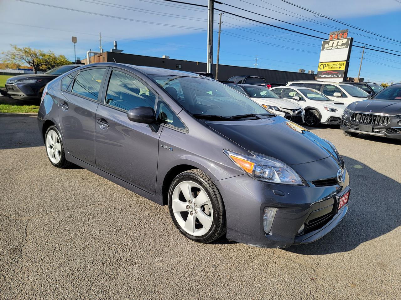 <p data-start=114 data-end=215><strong data-start=114 data-end=215>For Sale: 2015 Toyota Prius &ndash; Hybrid Efficiency, Leather Interior, Alloy Wheels | Extremely Clean</strong></p><p data-start=217 data-end=508>Drive smarter with this <strong data-start=241 data-end=262>2015 Toyota Prius</strong> &mdash; a perfect blend of legendary Toyota reliability, advanced hybrid technology, and upscale comfort. This well-maintained vehicle is in <strong data-start=398 data-end=421>excellent condition</strong> inside and out, and it&rsquo;s ready to deliver years of worry-free, fuel-efficient driving.</p><p data-start=510 data-end=681>With <strong data-start=515 data-end=532>leather seats</strong> and <strong data-start=537 data-end=553>alloy wheels</strong>, this Prius stands out with both style and practicality &mdash; ideal for anyone looking to save on gas without sacrificing features.</p><hr data-start=683 data-end=686 /><h3 data-start=688 data-end=712>🌿 <strong data-start=695 data-end=712>Key Features:</strong></h3><ul data-start=714 data-end=1546><li data-start=714 data-end=768><p data-start=716 data-end=768><strong data-start=716 data-end=766>1.8L 4-Cylinder Hybrid Engine + Electric Motor</strong></p></li><li data-start=769 data-end=840><p data-start=771 data-end=840><strong data-start=771 data-end=815>Continuously Variable Transmission (CVT)</strong> &ndash; Smooth and efficient</p></li><li data-start=841 data-end=927><p data-start=843 data-end=927><strong data-start=843 data-end=860>Fuel Economy:</strong> ~4.5 L/100km city / ~4.9 L/100km highway (combined ~4.7 L/100km)</p></li><li data-start=928 data-end=966><p data-start=930 data-end=966><strong data-start=930 data-end=964>EV, Eco, and Power Drive Modes</strong></p></li><li data-start=967 data-end=1032><p data-start=969 data-end=1032><strong data-start=969 data-end=994>Leather-Trimmed Seats</strong> &ndash; Premium comfort and easy to clean</p></li><li data-start=1033 data-end=1075><p data-start=1035 data-end=1075><strong data-start=1035 data-end=1051>Alloy Wheels</strong> &ndash; Durable and stylish</p></li><li data-start=1076 data-end=1117><p data-start=1078 data-end=1117><strong data-start=1078 data-end=1115>Keyless Entry & Push-Button Start</strong></p></li><li data-start=1118 data-end=1164><p data-start=1120 data-end=1164><strong data-start=1120 data-end=1162>Touchscreen Display with Backup Camera</strong></p></li><li data-start=1165 data-end=1219><p data-start=1167 data-end=1219><strong data-start=1167 data-end=1217>Bluetooth Hands-Free Calling & Audio Streaming</strong></p></li><li data-start=1220 data-end=1250><p data-start=1222 data-end=1250><strong data-start=1222 data-end=1248>USB & Auxiliary Inputs</strong></p></li><li data-start=1251 data-end=1284><p data-start=1253 data-end=1284><strong data-start=1253 data-end=1282>Automatic Climate Control</strong></p></li><li data-start=1285 data-end=1339><p data-start=1287 data-end=1339><strong data-start=1287 data-end=1337>Split-Folding Rear Seats for Extra Cargo Space</strong></p></li><li data-start=1340 data-end=1362><p data-start=1342 data-end=1362><strong data-start=1342 data-end=1360>Cruise Control</strong></p></li><li data-start=1363 data-end=1404><p data-start=1365 data-end=1404><strong data-start=1365 data-end=1402>Power Windows, Locks, and Mirrors</strong></p></li><li data-start=1405 data-end=1440><p data-start=1407 data-end=1440><strong data-start=1407 data-end=1438>Regenerative Braking System</strong></p></li><li data-start=1441 data-end=1496><p data-start=1443 data-end=1496><strong data-start=1443 data-end=1494>Stability Control, Traction Control, ABS Brakes</strong></p></li><li data-start=1497 data-end=1546><p data-start=1499 data-end=1546><strong data-start=1499 data-end=1546>Multiple Airbags + Toyota Safety Technology</strong></p></li></ul><hr data-start=1548 data-end=1551 /><p data-start=1553 data-end=1754>If you&rsquo;re looking for unbeatable fuel economy, a comfortable ride, and the proven durability of a Toyota hybrid, this 2015 Prius is the perfect choice. <strong data-start=1705 data-end=1725>Contact us today</strong> to schedule your test drive!</p><p><strong>Additional Certification Cost</strong>: The full certification cost for this vehicle is <strong>$790 + HST</strong>.</p><p><strong>What&rsquo;s Included with Certification</strong>:</p><ul><li>The vehicle will be delivered with a <strong>valid safety certification</strong> and a <strong>36-day safety item warranty</strong> for your peace of mind.</li><li>A <strong>fresh oil change</strong> will be performed, and all fluids will be topped up.</li><li>The vehicle will be <strong>professionally detailed</strong>, ensuring it looks and feels like new when you pick it up.</li></ul><p>At <strong>Twin Oaks Auto</strong>, we are committed to providing a <strong>hassle-free car buying experience</strong>. From your first inquiry to driving off in your new car, our goal is to get you on the road quickly and stress-free!</p><p><strong>Financing Options Available!</strong><br />Flexible financing options are available to suit your needs. Contact us for more details.</p><p><strong>Contact Us Today</strong>:<br />📞 <strong>Call Us</strong>: 905-339-3330<br />📍 <strong>Location</strong>: 2470 Royal Windsor Drive, Oakville, Ontario, L6J 7Y2</p><p><br />(Conveniently located between Ford Drive and Winston Churchill Blvd.)</p><p><strong>More Information</strong>:<br />Visit our website at <strong><a href=http://www.twinoaksauto.com>TwinOaksAuto.com</a></strong> to view additional pictures, explore our inventory, and access CARFAX reports.</p><p>&nbsp;</p>