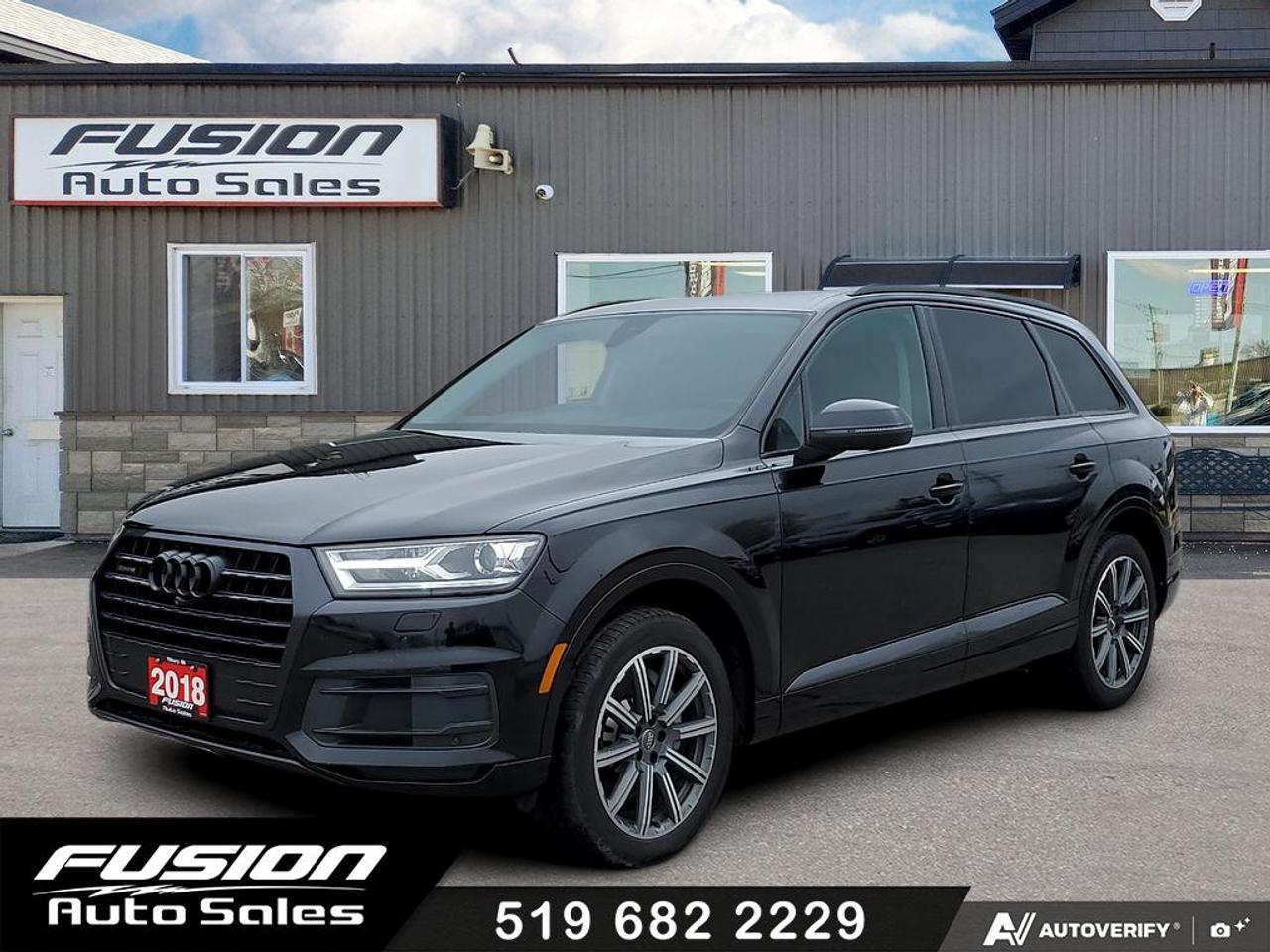 <p>2.0L 4Cyl Turbocharged, 252 HP, 8 Speed Automatic Transmission with Tiptronic, 7 Passenger Third Row Seating with Power Folding Third Row, Full Leather Interior with Heated/Cooled Seats, Heated 2nd Row Seating, Navigation, Power Panoramic Sunroof with Power Sunshade, Power Seats, Rear/Front/Side Cameras, Ally Wheels, Bluetooth, Power Rear Liftgate and more. Lic & HST Extra.</p><p>Are you looking for a luxurious and capable SUV that seamlessly blends performance and practicality? Feast your eyes on this stunning 2018 Audi Q7 2.0 TFSI quattro Progressiv, now available at Fusion Auto Sales. This sophisticated SUV, cloaked in a sleek black exterior, exudes an air of timeless elegance that is sure to turn heads. With its robust 2.0L Turbocharged engine and quattro all-wheel-drive system, the Q7 delivers a thrilling driving experience, perfect for navigating both city streets and challenging terrains with confidence.</p><p>Step inside and youll be greeted by a refined black leather interior, offering a sanctuary of comfort and style. This Audi Q7, with 156,567km on the odometer, has been meticulously maintained and is ready to provide you with years of reliable service. Its spacious cabin offers ample room for passengers and cargo, making it an ideal choice for families and adventure seekers alike. The automatic transmission ensures a smooth and effortless ride, allowing you to fully enjoy the journey.</p><p>Here are five standout features that make this 2018 Audi Q7 a must-see:</p><ul><li><strong>Quattro All-Wheel Drive:</strong> Experience unparalleled grip and control in all weather conditions.</li><li><strong>Turbocharged Engine:</strong> Enjoy exhilarating acceleration and responsive performance.</li><li><strong>Luxurious Leather Interior:</strong> Indulge in premium comfort and sophistication.</li><li><strong>Spacious Cabin:</strong> Benefit from ample room for passengers and cargo.</li><li><strong>Elegant Design:</strong> Turn heads with its timeless and sophisticated aesthetic.</li></ul><p><strong><em>Powered by AutoIntelligence&trade;</em></strong> Vehicle information has been generated using artificial intelligence and is provided for informational purposes only. While efforts are made to ensure accuracy, please confirm all details directly with the dealer.</p><p>The Fusion Philosophy<br><br>At Fusion Auto Sales, we put more effort into buying our vehicles than we do trying to sell them. By constantly monitoring what other car lots are doing, we strive to be the lowest priced dealer in our market. We won&rsquo;t purchase a vehicle to &ldquo;fill a hole&rdquo;. We know that the vehicles on our lot are great value for the money and smart shoppers realize that also. Adhering to this philosophy makes it easy for our customers. If they find a vehicle on our lot that fulfills their needs and wants, they know that they&rsquo;re getting great value. <br><br>If we don&rsquo;t have what you&rsquo;re looking for, we can find it! Over 150 customers have saved thousands of dollars buy joining our&rdquo; locate club&rdquo;. People that know what they want and what they want to pay (within reason of course), get the vehicle of their dreams and enjoy huge savings. Contact us for details.<br><br><br><br>Fusion Auto Sales is in Tilbury, Ont. located between Windsor and London right off the 401. We are among 7 dealerships within a &frac12; kilometer distance which is great for out of town shoppers. We began satisfying customers in 2009 and have been doing so ever since. In 2012 Fusion was recognized as 1 of the 50 fastest growing companies in Canada. And then, in 2018, we were named one of the top 5 independent automobile dealerships in the country. <br><br>We specialize in late model vehicles at below than average pricing, everything is fully certified and every unit is Car Proof verified and is fully disclosed with every unit. We offer every type of financing from perfect credit at great rates to credit challenges with competitive rates. We also specialize in locating vehicles for customers, we cant have everything on the lot so if you do not see it and are having a hard time finding what you are looking for, let us know and we can find it for you. Fusion Auto Sales spans its customer base from Windsor all the way to Timmins, On and every where in between. Our philosophy is You are going to like the way we deal and everyone does, straight honest answers with no monkey business and no back and forth between sales and managers.</p>