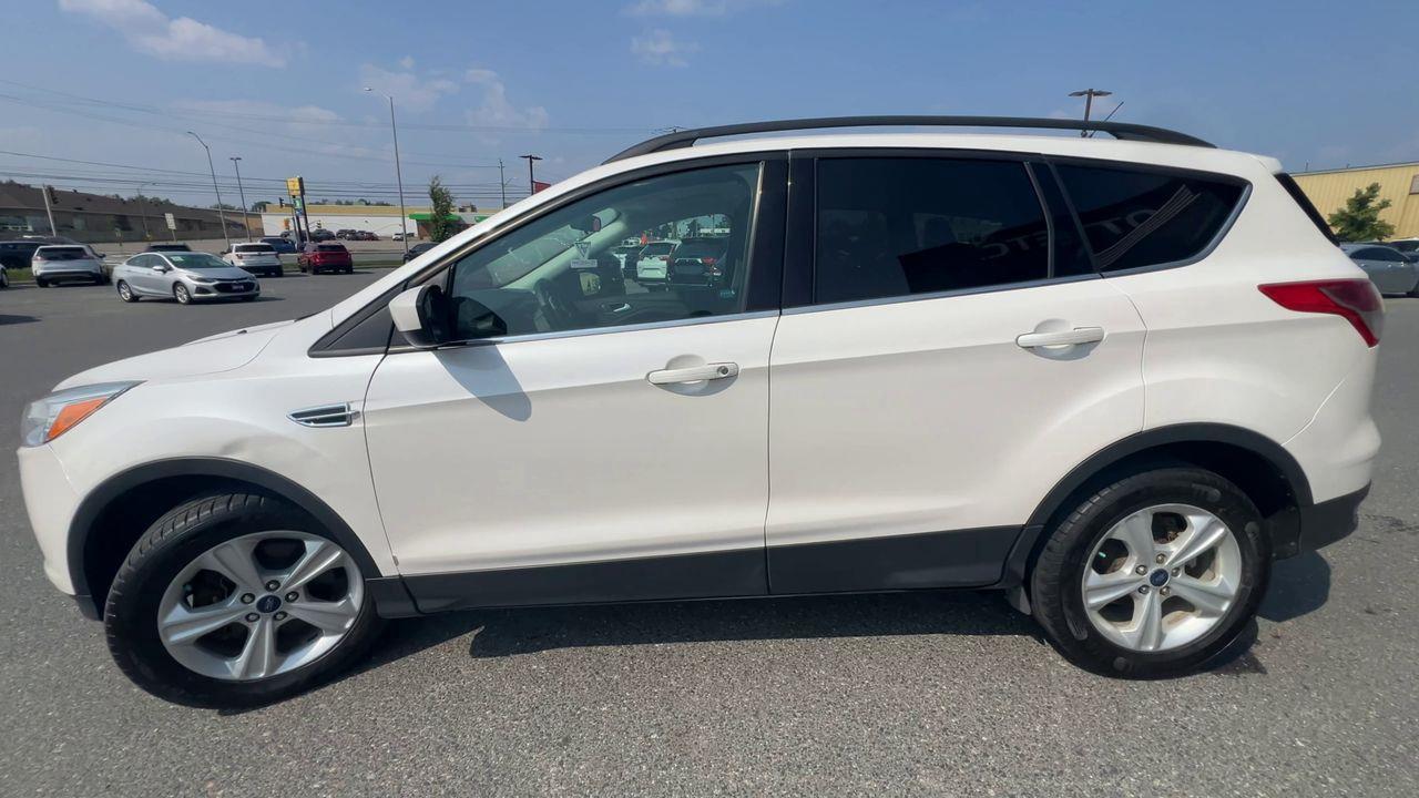 2015 Ford Escape AS-IS,BACK UP CAM, CRUISE CONTROL, BLUETOOTH, POWER DRIVERS SEAT, POWER LIFTGATE!! Photo4