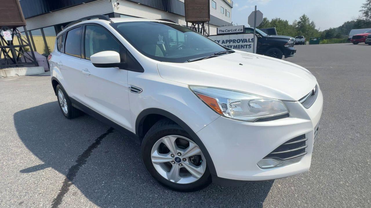 2015 Ford Escape AS-IS,BACK UP CAM, CRUISE CONTROL, BLUETOOTH, POWER DRIVERS SEAT, POWER LIFTGATE!! Photo