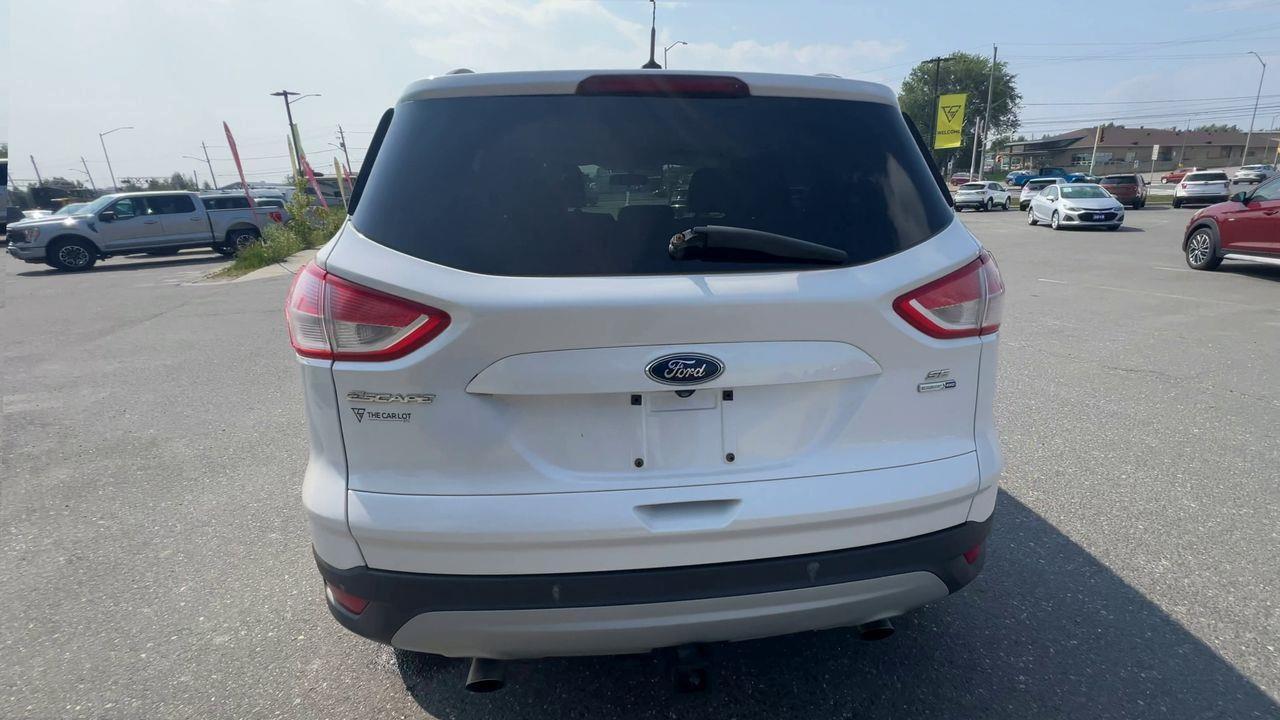 2015 Ford Escape AS-IS,BACK UP CAM, CRUISE CONTROL, BLUETOOTH, POWER DRIVERS SEAT, POWER LIFTGATE!! Photo