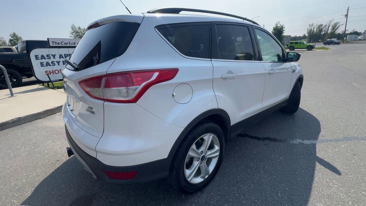 2015 Ford Escape AS-IS,BACK UP CAM, CRUISE CONTROL, BLUETOOTH, POWER DRIVERS SEAT, POWER LIFTGATE!! Photo