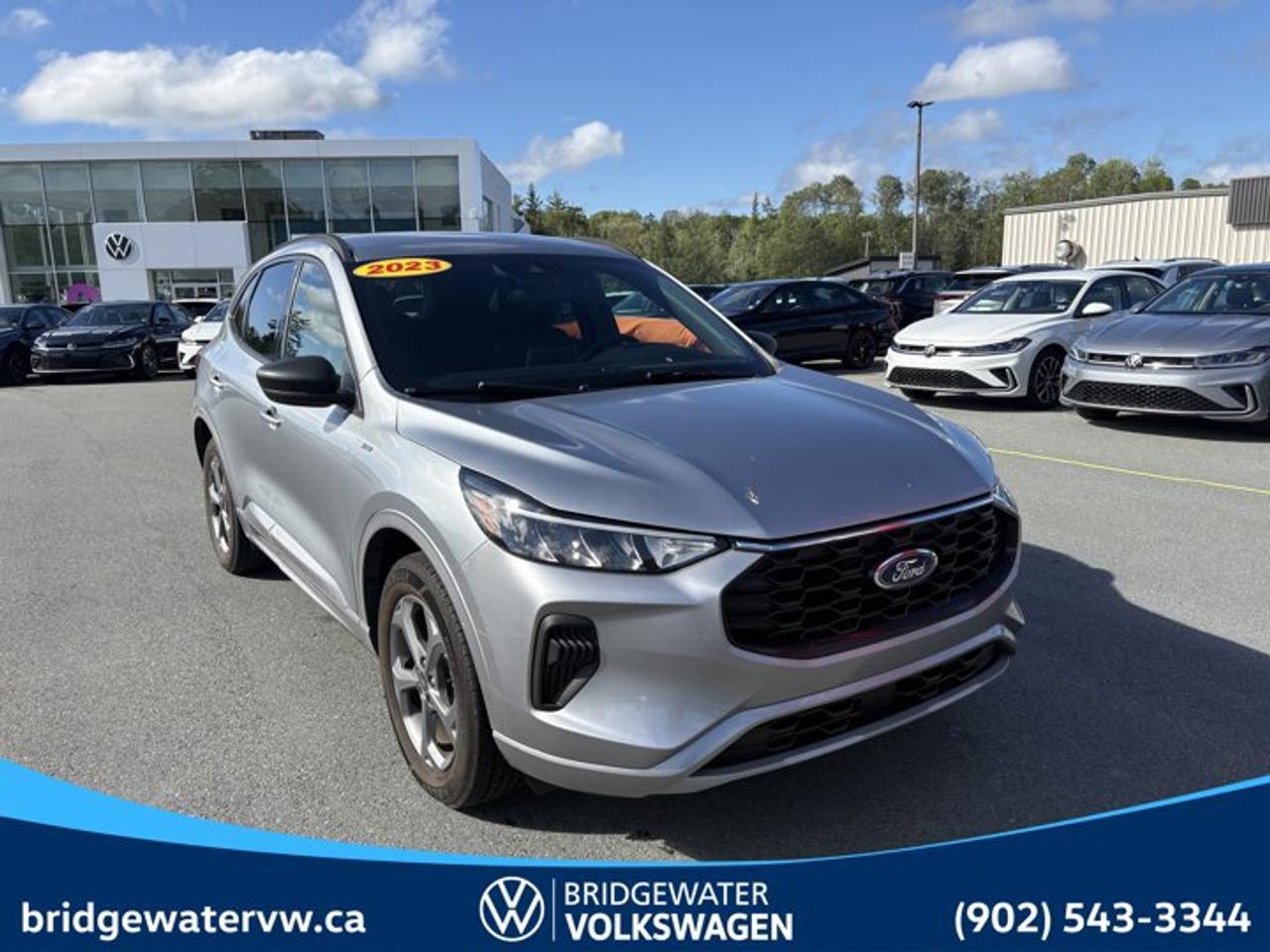 New Price! 2023 Ford Escape ST-LineAWD | Apple CarPlay | Android Auto | Sirus XM Certified.This vehicle is a Steele Certified Pre-Owned Vehicle, offering added confidence through enhanced inspection standards and dealership-backed benefits. Steele Certified Reconditioning Process: Comprehensive multi-point inspection Mechanical and cosmetic reconditioning completed as needed Brake, tire, and battery assessment Professional detailing Final quality control road test Steele Certified Pre-Owned vehicles include additional ownership benefits. Any concerns related to the certification process must be reviewed and addressed by the original selling dealer.Silver Metallic AWD 8-Speed Automatic 1.5L EcoBoost AWD, 3.81 Axle Ratio, 4-Way Manual Passenger Seat, 4-Wheel Disc Brakes, 6 Speakers, 8-Way Power Driver Seat, ABS brakes, Air Conditioning, Alloy wheels, AM/FM radio: SiriusXM, Auto High-beam Headlights, Automatic temperature control, Block heater, Brake assist, Bumpers: body-colour, Cold Weather Package, Compass, Delay-off headlights, Driver door bin, Driver vanity mirror, Dual front impact airbags, Dual front side impact airbags, Electronic Fuel Door Release, Electronic Stability Control, Emergency communication system: SYNC 4 911 Assist, Equipment Group 300A, Four wheel independent suspension, Front anti-roll bar, Front Bucket Seats, Front dual zone A/C, Front reading lights, Fully automatic headlights, Heated door mirrors, Heated Front Row Seats, Heated Premium-Wrapped Steering Wheel, Heated Sideview Mirrors, Heated steering wheel, Illuminated entry, Knee airbag, Low tire pressure warning, Neutral Towing Capability, Occupant sensing airbag, Outside temperature display, Overhead airbag, Overhead console, Panic alarm, Partial Vinyl & Cloth Sport Contour Bucket Seats, Passenger door bin, Passenger vanity mirror, Pedestrian Alert Sounder, Power door mirrors, Power driver seat, Power Liftgate, Power steering, Power windows, Radio data system, Radio: AM/FM Stereo w/SiriusXM, Rear anti-roll bar, Rear reading lights, Rear window defroster, Rear window wiper, Remote keyless entry, Remote Start System, Roof rack: rails only, Speed control, Speed-sensing steering, Speed-Sensitive Wipers, Split folding rear seat, Spoiler, Sport steering wheel, Steering wheel mounted audio controls, SYNC 4 Communications & Entertainment System, Tachometer, Telescoping steering wheel, Tilt steering wheel, Traction control, Trip computer, Variably intermittent wipers, Wheels: 18 Rock Metallic Painted Aluminum.