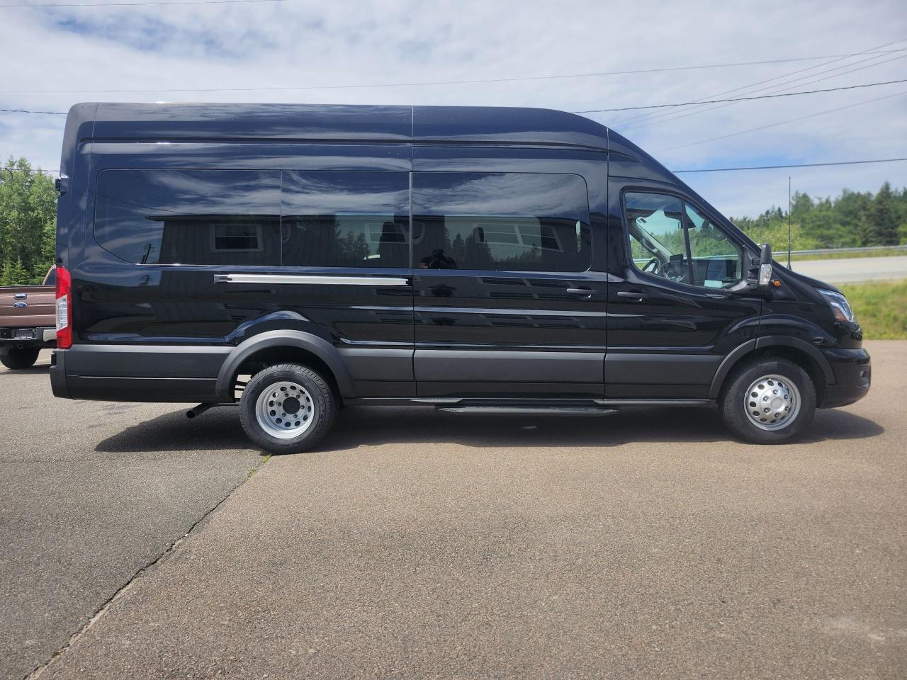 2025 Ford Transit Passenger Wagon T-350 HD 148" EL HIGH ROOF XLT DRW AWD Photo