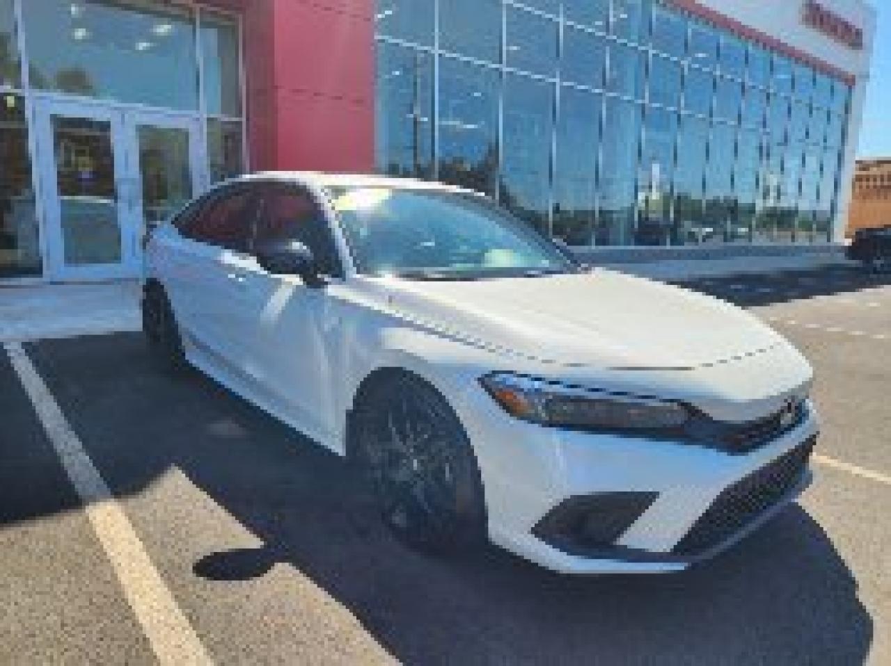 <span>The Honda Civic is part of Canadas automotive heritage. The first Civic arrived in Canada nearly five decades ago. Its been built in Canada for 34 years. It was Canadas best-selling car for 24 consecutive years. You cant separate Canadas vehicular landscape from the Honda Civic.</span>




<span>The Civic is a legend, yet this 2022 Honda Civic is also a class-leading, award-winning, critically acclaimed, modern and high-tech sports sedan. This 2022 Honda Civic Sport is a perfect symbol of what makes the 11th-generation Civic so great, exemplified by upmarket content like a sunroof, rain-sensing wipers, dual-zone automatic climate control, and proximity access/pushbutton start. </span>




<span>There are also heated front seats, a heated steering wheel,  auto high beams, blind spot monitoring, and Honda Sensing (adaptive cruise, lane keeping assist, etc.), and a 7-inch centre screen with Apple CarPlay/Android Auto. Key upgrades in the Civic Sport include 18-inch alloys, unique exterior treatments, and leather-bolstered seats.</span>




<span style=font-weight: 400;>Thank you for your interest in this vehicle. Its located at Centennial Honda, 610 South Drive, Summerside, PEI. We look forward to hearing from you; call us toll-free at 1-902-436-9158.</span>
