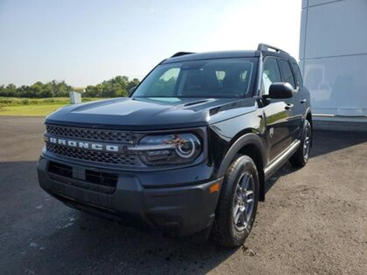 This rugged and refined 2025 Ford Bronco Sport Big Bend 200A stands out in Shadow Black. Built to tackle adventure and city streets alike, this 5-passenger SUV is powered by a 1.5L EcoBoost® engine, delivering 181 horsepower and 190 lb-ft of torque. Coupled with an 8-speed automatic transmission, the Bronco Sport offers impressive fuel efficiency and performance to match your lifestyle.

Key Features Include:
Heated Front Seats
8-Way Power Drivers Seat
SYNC® 4 with a 13.2 Color Touchscreen
Ford Co-Pilot360 Assist+ featuring Adaptive Cruise Control with Stop & Go
Terrain Management System with 5 G.O.A.T. Modes
LED Headlamps, Fog Lamps, and Signature Lighting
17 Carbonized Grey-Painted High Gloss Aluminum Wheels
Wireless Apple CarPlay® and Android Auto Compatibility
Rain-Sensing Windshield Wipers and Privacy Glass
Intelligent Access with Push-Button Start

Moose Jaw Ford, conveniently located at 1010 North Service Road in Moose Jaw, is your trusted destination for all your automotive needs. With an impressive 4.8-star Google rating from nearly 1,500 reviews, we are proud to deliver an exceptional vehicle-buying experience tailored just for you. Our Moose Jaw Motives set us apart, offering unbeatable value like half-priced oil changes for life on pre-owned vehicles, one year of key and remote protection, and one year of tire and rim protection. Enjoy peace of mind with every purchase. At Moose Jaw Ford, were committed to driving positive change in our community by combining exceptional service, high-quality vehicles, and a guest-first approach. Visit us today!