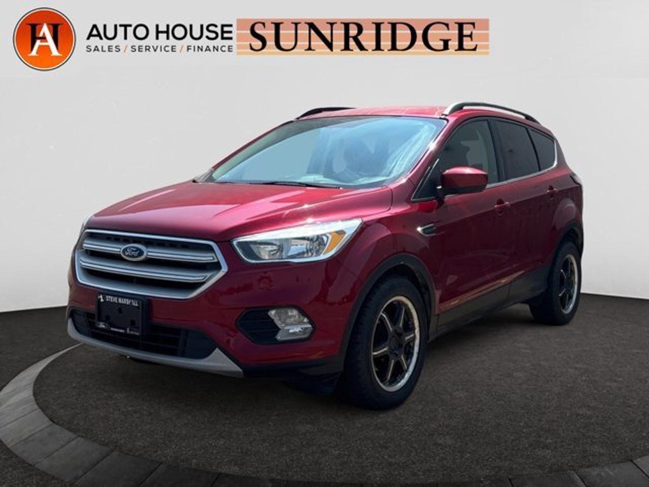 2018 FORD ESCAPE SE WITH 97988 KMS, FWD, BACKUP CAMERA, HEATED MIRRORS, AUTO STOP/START, HEATED FRONT SEATS, BLUETOOTH, USB/AUX, POWER WINDOWS LOCKS SEATS AND MORE!.ALL CREDIT ACCEPTED!One month at a job? Bankruptcy? New to Canada? Collections? Student or work visas? Previous repossessions? Good or bad credit? Weve got you covered! Get pre-approved today at www.autoshouse.com!What We Offer:*Low Bi-Weekly Payments*Instant Approvals*Credit Consolidation*Employment Insurance*Negative Equity CoverageOperating Hours:Mon-Thurs: 10 am -- 8 pmFri-Sat: 10 am -- 6 pmCall 403-263-4446! All vehicles come with a full mechanical fitness assessment.CARFAX IS AVAILABLE TO THE CONSUMER.Referral Program:Refer friends and family and earn $500 for each referral!AMVIC Licensed DealerAfter a credit check, we can determine payments, APR, terms, and interest rates based on your credit (O.A.C). Individual credit will affect bi-weekly payments and the total cost of credit . Newer Vehicles May Come With Apple Carplay, Android Auto. Similar to Chevrolet, GMC, Honda, Toyota, Cadillac, Nissan, Ford, Volvo 2007, 2008, 2009, 2010, 2011, 2012, 2013, 2014, 2015, 2016, 2017, 2018Location: 2404 23rd Ave. N.E. Calgary AB, T2E 8J4All photos are of the vehicle featured in the advertisement.