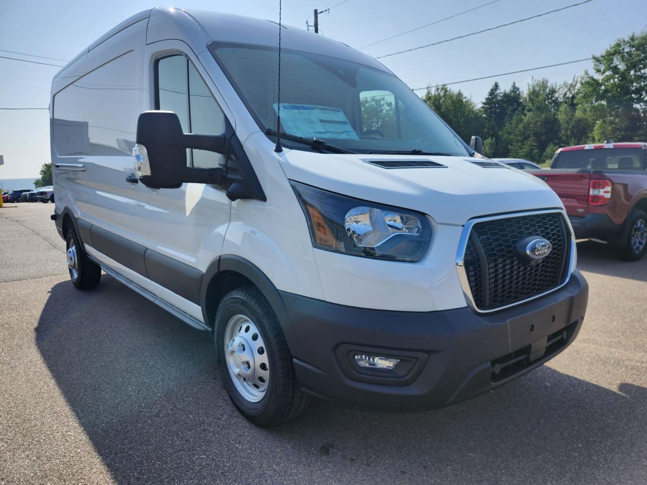 2025 Ford Transit Cargo Van T-250 148" MED RF 9070 GVWR AWD Photo2