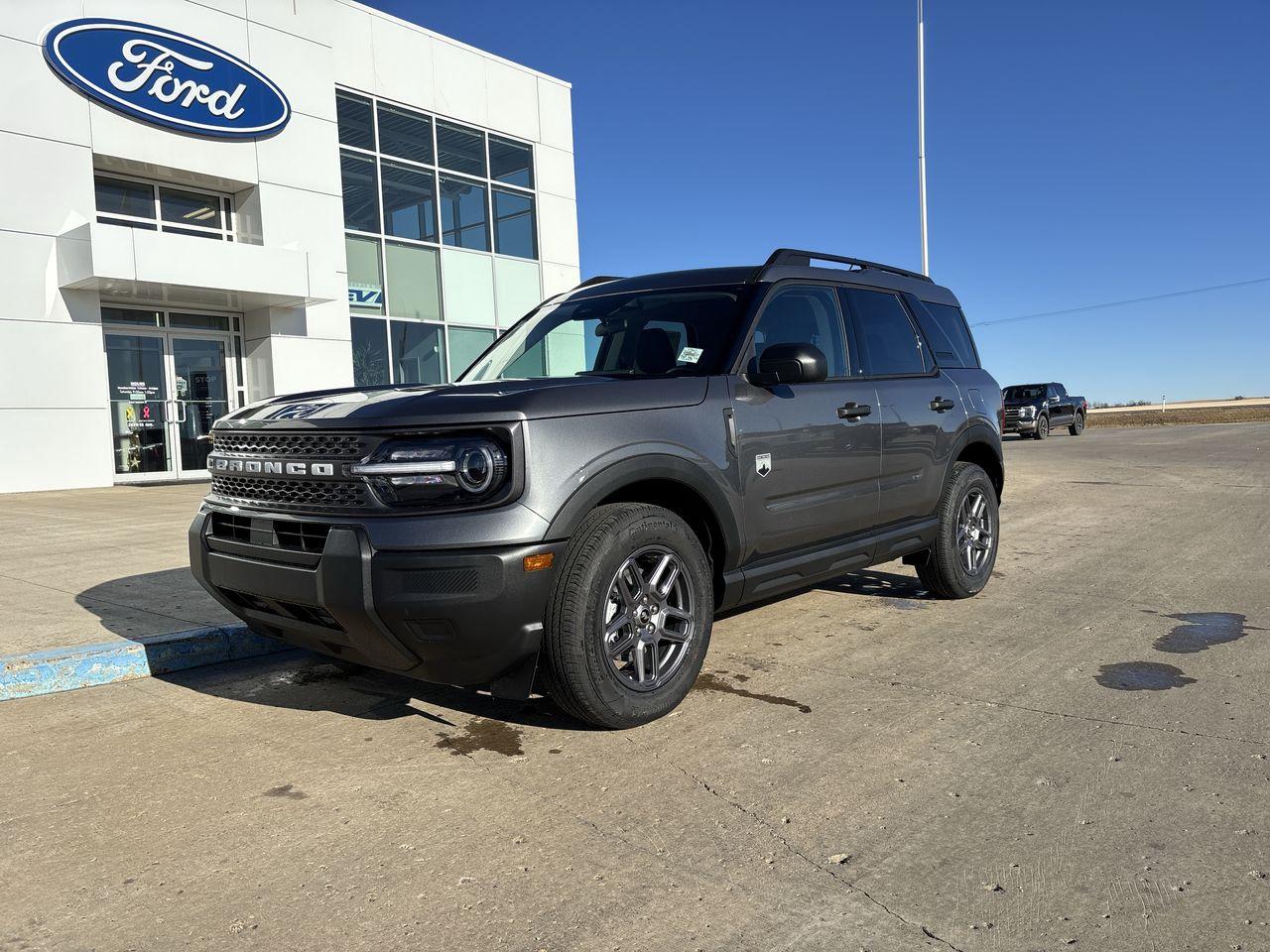 <p>Looking for adventure? Webbs 1441 is thrilled to present a brand-new 2025 Ford Bronco Sport Big Bend 4x4, ready to conquer any terrain. This rugged SUV, painted in a sleek Carbonized Grey Metallic, is built for both city streets and off-road trails. With its four-wheel-drive capability and automatic transmission, youll experience a smooth and confident ride, no matter where your journey takes you.</p>
<p>This Bronco Sport Big Bend is packed with features designed for comfort and convenience. The interior boasts durable cloth seating with easy-clean material, perfect for those muddy adventures. Under the hood, youll find a responsive 1.5L EcoBoost engine paired with an 8-speed automatic transmission, offering a blend of power and efficiency. This is the perfect vehicle for the Canadian climate.</p>
<p>Here are five standout features of this exciting new Bronco Sport:</p>
<ul>
<li><strong>Carbonized Grey Metallic:</strong> Turn heads with this stylish and modern exterior colour.</li>
<li><strong>4x4 Capability:</strong> Tackle any terrain with confidence.</li>
<li><strong>1.5L EcoBoost Engine:</strong> Experience a powerful and efficient ride.</li>
<li><strong>Easy Clean Interior:</strong> Designed for your active lifestyle.</li>
<li><strong>Automatic Transmission:</strong> Enjoy a smooth and effortless driving experience.</li>
</ul>
<p><strong><em>Powered by AutoIntelligence™</em></strong>
Powered by AutoIntelligence™</p>

