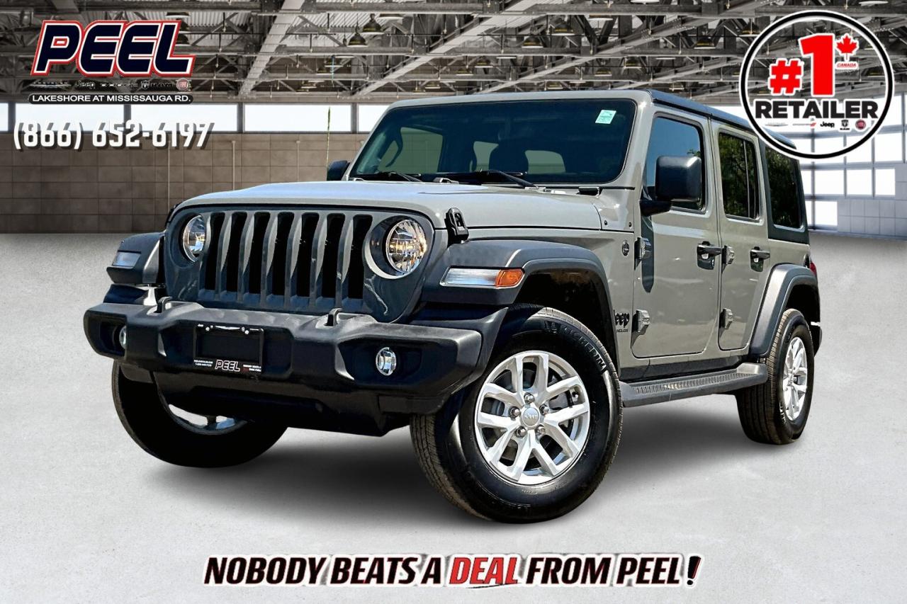 COME SEE WHY NOBODY BEATS A DEAL FROM PEEL! Your Source for ALL make and models used cars and trucks. Canadas #1 Stellantis Retailer for 9 years & counting!!

2023 Jeep Wrangler 4-Door Sport S 4X4 | 3.6L V6 | Sting Grey | Heated Cloth Bucket Seats | Uconnect 8.4" Touchscreen Display w/ Navigation | Alpine Premium Audio System | Apple CarPlay & Android Auto | Heated Steering Wheel | Remote Start | Technology Group | Convenience Group | Dual-zone Automatic Climate Control | Remote Proximity Keyless Entry | Auto-dimming Rearview Mirror | Black Freedom 3-piece Hard Top | Trailer Tow Group | Class II Hitch Receiver

One Owner Clean Carfax

Stand out from the pack in this adventure-ready Sting Grey 2023 Jeep Wrangler 4-Door Sport S 4X4, powered by the trusted 3.6L V6 engine and packed with all the features you crave. Inside, heated cloth bucket seats, dual-zone automatic climate control, and a heated steering wheel make every journey comfortable, while the Uconnect 8.4" touchscreen with navigation, Alpine Premium Audio System, Apple CarPlay, and Android Auto keeps you effortlessly connected and entertained. Convenience is built-in thanks to remote start, remote proximity keyless entry, an auto-dimming rearview mirror, and the Convenience and Technology Groups. The rugged Black Freedom 3-piece hard top offers versatility and iconic Jeep style, while the Trailer Tow Group with Class II hitch receiver ensures youre always adventure-ready. With a One Owner Clean Carfax, this Wrangler Sport S perfectly blends legendary Jeep capability with modern comfort and tech, ready to elevate your driving experience from trails to city streets.
______________________________________________________

Engage & Explore with Peel Chrysler: Whether youre inquiring about our latest offers or seeking guidance, 1-866-652-6197 connects you directly. Dive deeper online or connect with our team to navigate your automotive journey seamlessly.

WE TAKE ALL TRADES & CREDIT. WE SHIP ANYWHERE IN CANADA! OUR TEAM IS READY TO SERVE YOU 7 DAYS!
______________________________________________________
Our advertised prices are for consumers (i.e end users) only.

*FREE CarFax (click the link above to check it out at no cost to you!)*

*FULLY CERTIFIED! (Have you seen some of these other dealers stating in their advertisements that certification is an additional fee? NOT HERE! Our certification is already included in our low sale prices to save you more!)

______________________________________________________

Peel Chrysler  A Trusted Destination: Based in Port Credit, Ontario, we proudly serve customers from all corners of Ontario and Canada including Toronto, Oakville, North York, Richmond Hill, Ajax, Hamilton, Niagara Falls, Brampton, Thornhill, Scarborough, Vaughan, London, Windsor, Cambridge, Kitchener, Waterloo, Brantford, Sarnia, Pickering, Huntsville, Milton, Woodbridge, Maple, Aurora, Newmarket, Orangeville, Georgetown, Stouffville, Markham, North Bay, Sudbury, Barrie, Sault Ste. Marie, Parry Sound, Bracebridge, Gravenhurst, Oshawa, Ajax, Kingston, Innisfil and surrounding areas. On our website www.peelchrysler.com, you will find a vast selection of new vehicles including the new and used Ram 1500, 2500 and 3500. Chrysler Grand Caravan, Chrysler Pacifica, Jeep Cherokee, Wrangler and more. All vehicles are priced to sell. We deliver throughout Canada. website or call us 1-866-652-6197.

Disclaimer Statement: At Peel Chrysler, your satisfaction is our priority. While many pre-owned vehicles originally come with two keys, variations may occur based on trade-ins, and all Peel Chrysler Pre-Owned Vehicles come standard with one keyany extras provided by the previous owner will be included with your purchase, and additional keys can be bought at the time of sale. Online prices and payments are for finance purchases. Used vehicles that are being financed are subject to a $499 (^$1500 non-prime) financing fee, while cash purchases (certified cheque, bank draft, or wire transfer) on used vehicles have a $2,000 surcharge ( online price + $2,000). Cash purchases of new vehicles only incur applicable taxes and licensing fees, and those priced above $100,000 (including accessories or add-ons) are subject to a federal luxury tax. Optional finance and lease terms are available, and if trading in a vehicle with an outstanding loan balance requiring Peel Chrysler to facilitate the lien payout, a Lien Payout Fee of $349 applies. Prices, rates, and payments are subject to change without notice. While we strive for accuracy, occasional technical or human errors may occur, so we encourage verifying all vehicle details, including features, options, materials, and specifications, with a Peel Chrysler representative by contacting us or visiting our dealership. Experience seamless convenience with our nationwide delivery options. Visit our website or contact us for more details.
