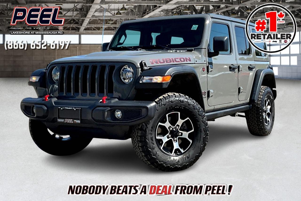 COME SEE WHY NOBODY BEATS A DEAL FROM PEEL! Your Source for ALL make and models used cars and trucks. Canadas #1 Stellantis Retailer for 9 years & counting!!

2023 Jeep Wrangler 4 Door Rubicon 4X4 | 2.0L Turbocharged I-4 Engine | Sting Grey | Cloth Bucket Seats | Uconnect 8.4" Touchscreen Display w/ Navigation | Alpine Premium Audio System | Apple Carplay & Android Auto | Black Freedom Top 3-piece hardtop | Black Rubicon Highline Fenders

One Owner Clean Carfax

Dominate trails and city streets alike in this tough and distinctive Sting Grey 2023 Jeep Wrangler Rubicon 4-Door 4X4, powered by a responsive and efficient 2.0L Turbocharged I-4 engine. Inside, durable cloth bucket seats pair with the advanced Uconnect 8.4" touchscreen featuring built-in navigation, Apple CarPlay, Android Auto, and a premium Alpine Audio System, ensuring every ride is as connected as it is entertaining. Sporting rugged style from the Black Freedom Top 3-piece hardtop and distinctive Black Rubicon Highline Fenders, this Wrangler stands out wherever you venture. With legendary Rubicon capability, Trail Rated toughness, and a One Owner Clean Carfax, this Jeep delivers the ultimate balance of off-road prowess and everyday practicality. Grab the wheel and turn your adventures up a notch!
______________________________________________________

Engage & Explore with Peel Chrysler: Whether youre inquiring about our latest offers or seeking guidance, 1-866-652-6197 connects you directly. Dive deeper online or connect with our team to navigate your automotive journey seamlessly.

WE TAKE ALL TRADES & CREDIT. WE SHIP ANYWHERE IN CANADA! OUR TEAM IS READY TO SERVE YOU 7 DAYS!
______________________________________________________
Our advertised prices are for consumers (i.e end users) only.

*FREE CarFax (click the link above to check it out at no cost to you!)*

*FULLY CERTIFIED! (Have you seen some of these other dealers stating in their advertisements that certification is an additional fee? NOT HERE! Our certification is already included in our low sale prices to save you more!)

______________________________________________________

Peel Chrysler  A Trusted Destination: Based in Port Credit, Ontario, we proudly serve customers from all corners of Ontario and Canada including Toronto, Oakville, North York, Richmond Hill, Ajax, Hamilton, Niagara Falls, Brampton, Thornhill, Scarborough, Vaughan, London, Windsor, Cambridge, Kitchener, Waterloo, Brantford, Sarnia, Pickering, Huntsville, Milton, Woodbridge, Maple, Aurora, Newmarket, Orangeville, Georgetown, Stouffville, Markham, North Bay, Sudbury, Barrie, Sault Ste. Marie, Parry Sound, Bracebridge, Gravenhurst, Oshawa, Ajax, Kingston, Innisfil and surrounding areas. On our website www.peelchrysler.com, you will find a vast selection of new vehicles including the new and used Ram 1500, 2500 and 3500. Chrysler Grand Caravan, Chrysler Pacifica, Jeep Cherokee, Wrangler and more. All vehicles are priced to sell. We deliver throughout Canada. website or call us 1-866-652-6197.

Disclaimer Statement: At Peel Chrysler, your satisfaction is our priority. While many pre-owned vehicles originally come with two keys, variations may occur based on trade-ins, and all Peel Chrysler Pre-Owned Vehicles come standard with one keyany extras provided by the previous owner will be included with your purchase, and additional keys can be bought at the time of sale. Online prices and payments are for finance purchases. Used vehicles that are being financed are subject to a $499 (^$1500 non-prime) financing fee, while cash purchases (certified cheque, bank draft, or wire transfer) on used vehicles have a $2,000 surcharge ( online price + $2,000). Cash purchases of new vehicles only incur applicable taxes and licensing fees, and those priced above $100,000 (including accessories or add-ons) are subject to a federal luxury tax. Optional finance and lease terms are available, and if trading in a vehicle with an outstanding loan balance requiring Peel Chrysler to facilitate the lien payout, a Lien Payout Fee of $349 applies. Prices, rates, and payments are subject to change without notice. While we strive for accuracy, occasional technical or human errors may occur, so we encourage verifying all vehicle details, including features, options, materials, and specifications, with a Peel Chrysler representative by contacting us or visiting our dealership. Experience seamless convenience with our nationwide delivery options. Visit our website or contact us for more details.