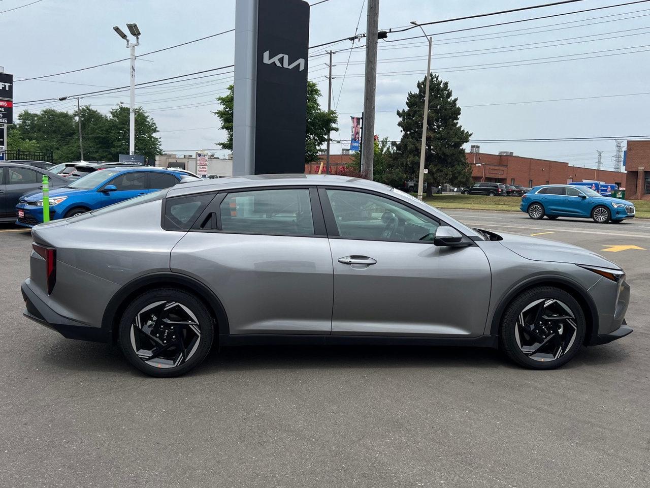 2025 Kia K4 EX Trim Pkg.   DEMO   Wireless Phone Charger Photo