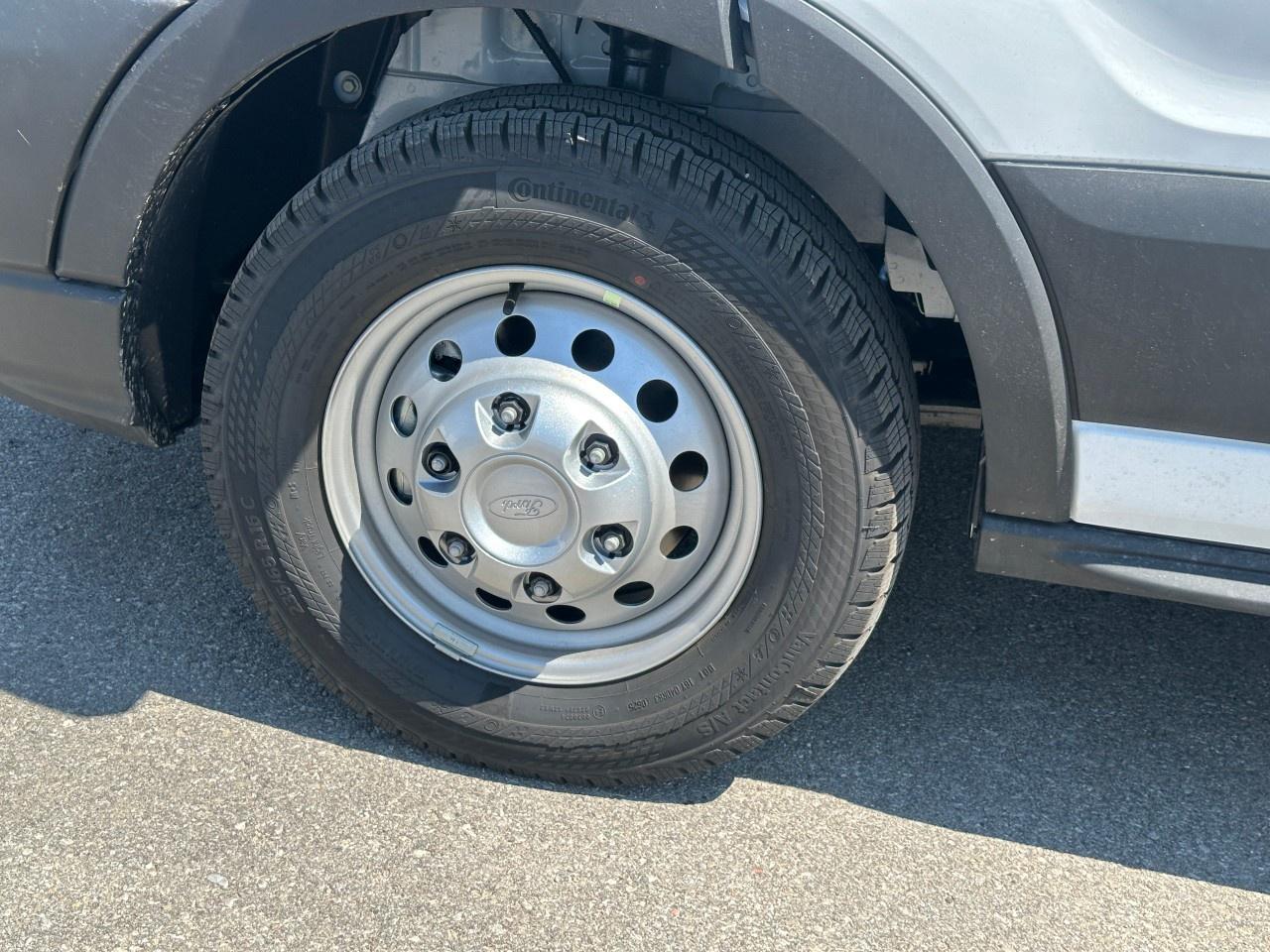 12795449