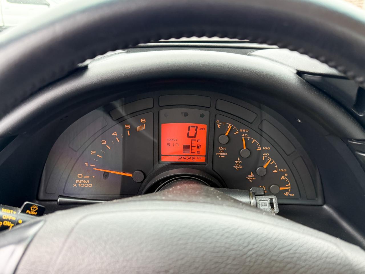 12795872