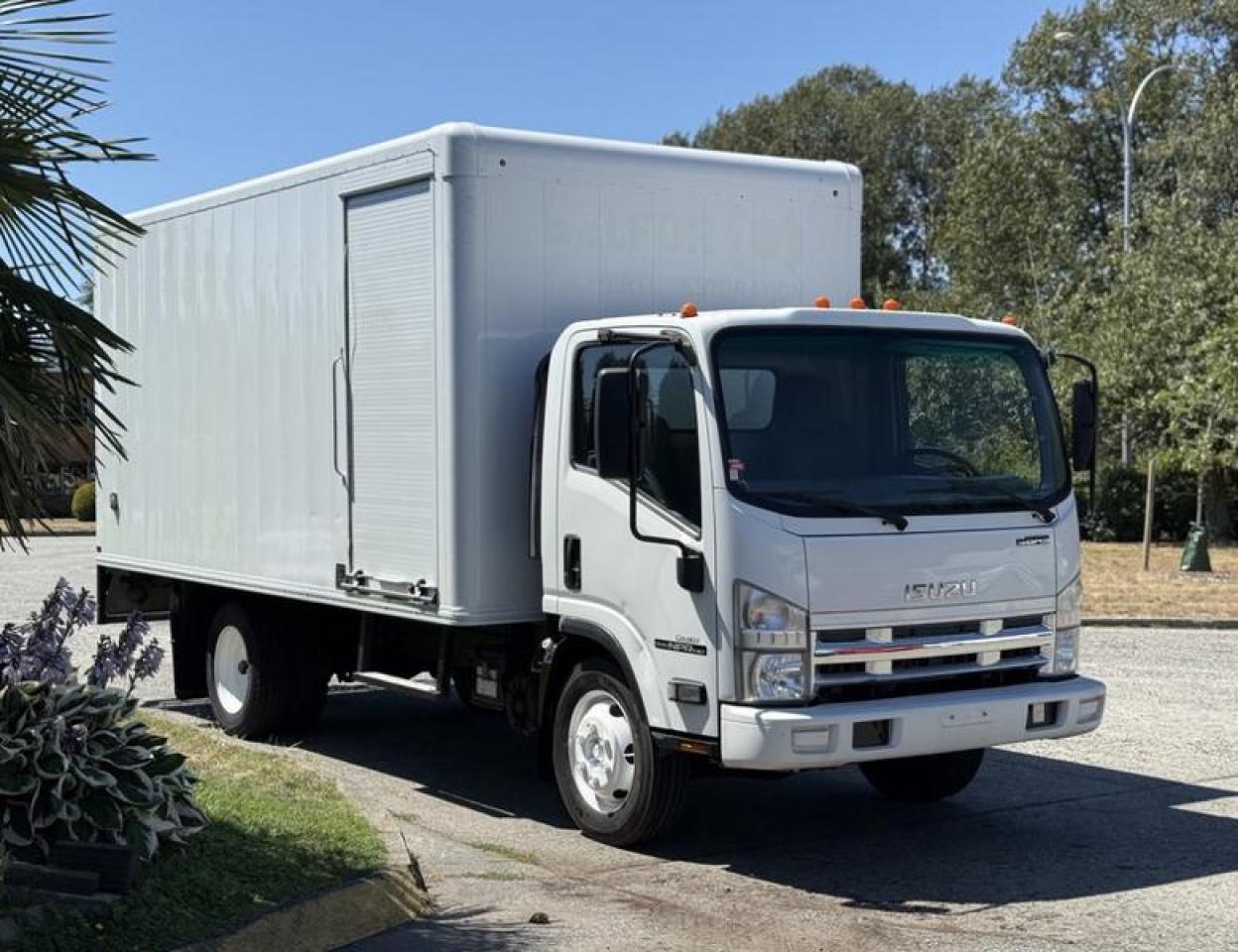 Used 2012 Isuzu NPR HD 16 Foot Cube Van With Ramp for sale in Burnaby, BC